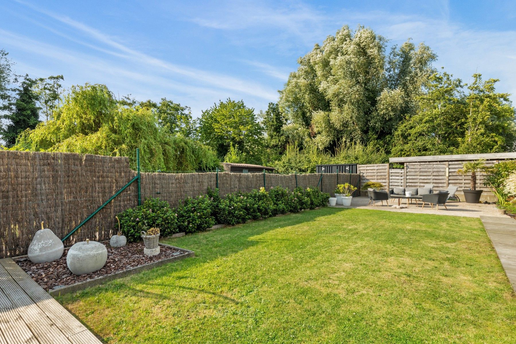 Ruime woning met prachtig onderhouden tuin foto 21