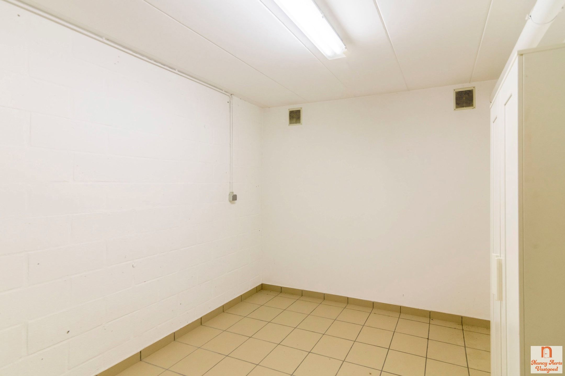 Lichtrijk duplexappartement met grote kelder en mega terras foto 26