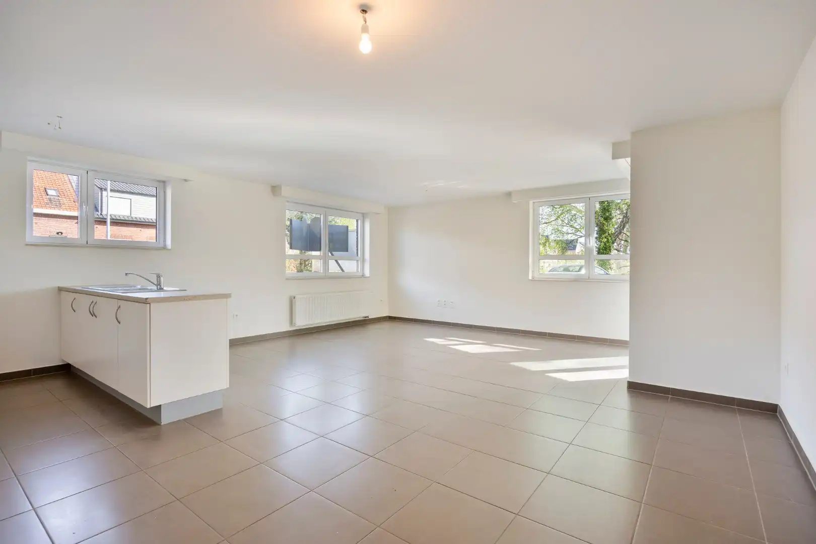 Ruim gelijkvloers 2 slaapkamer appartement met garage op centrale ligging te Dessel foto 4