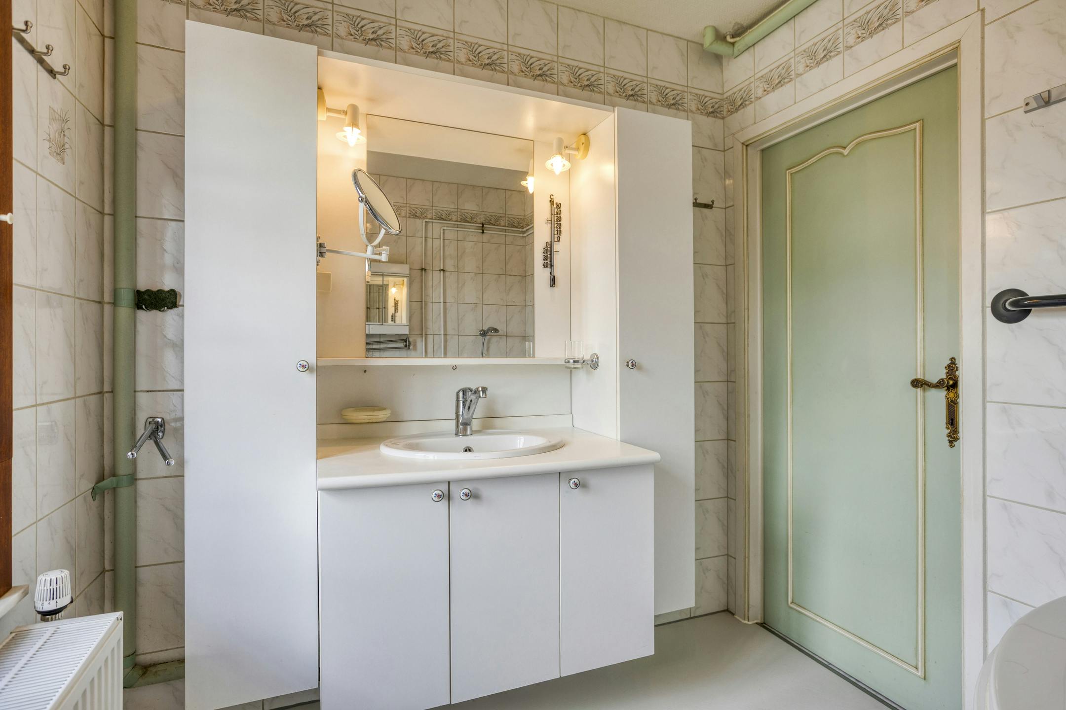 Halfopen huis te koop in Ieper met 4 kamers, tuin en garage foto 28