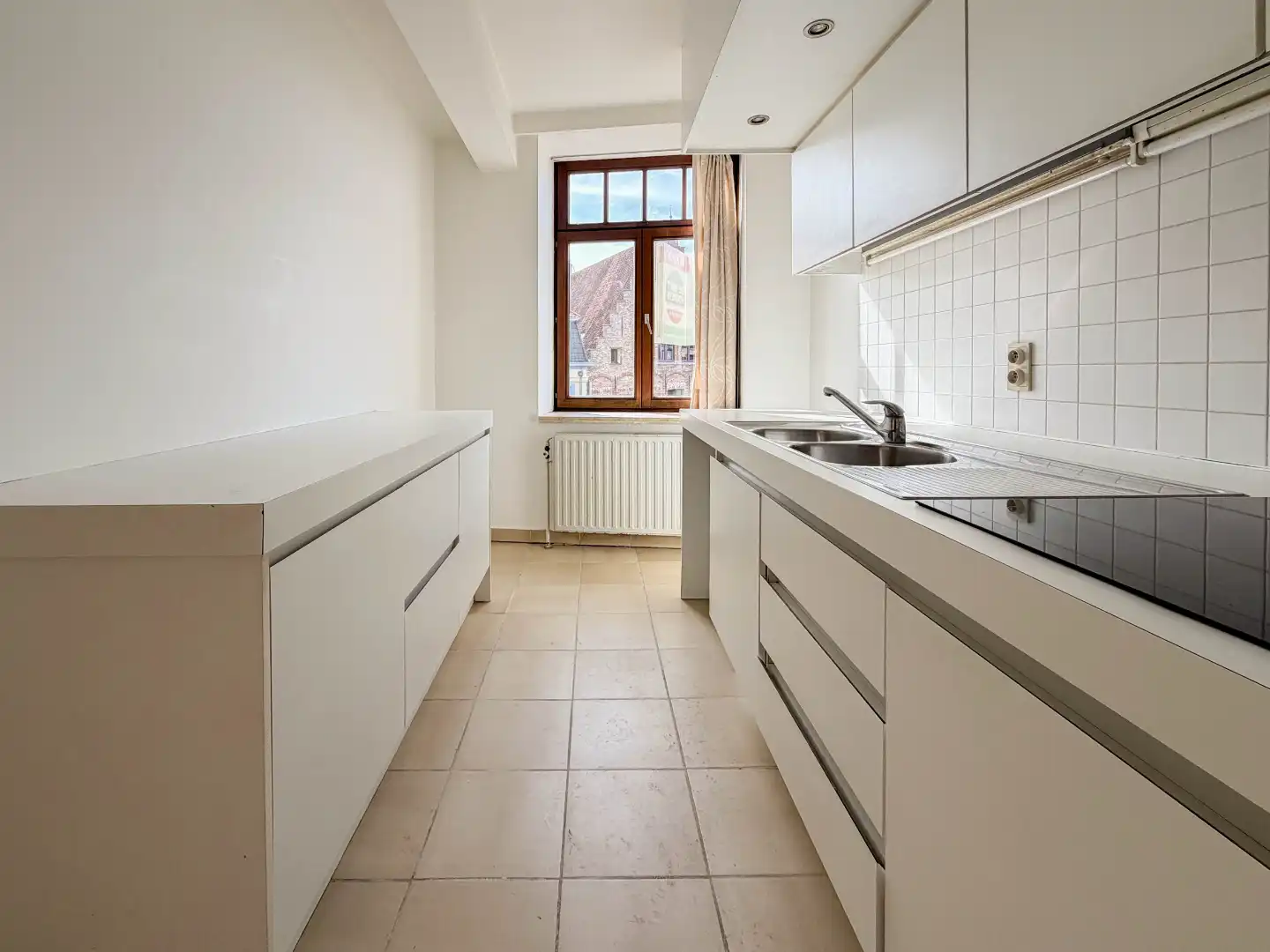 centraal gelegen appartement met prachtig zicht op de Halletoren foto 10