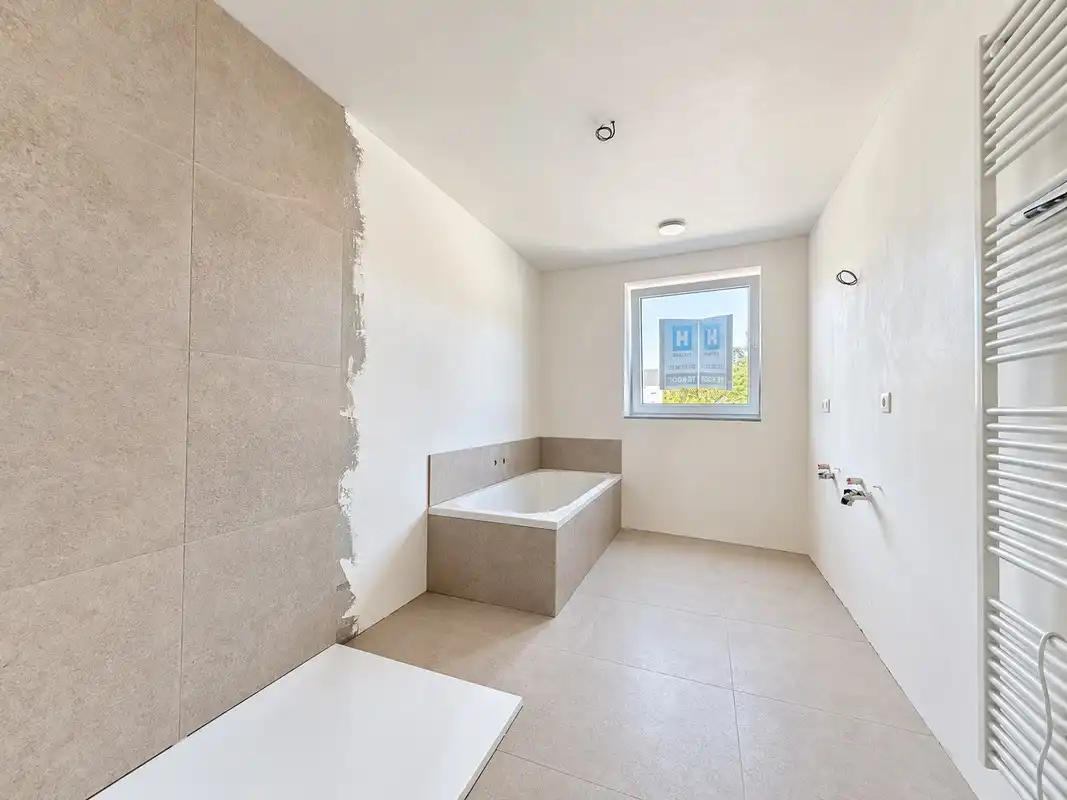 HECTAAR bouwt 2 moderne nieuwbouwwoningen in Steenhuffel foto 8