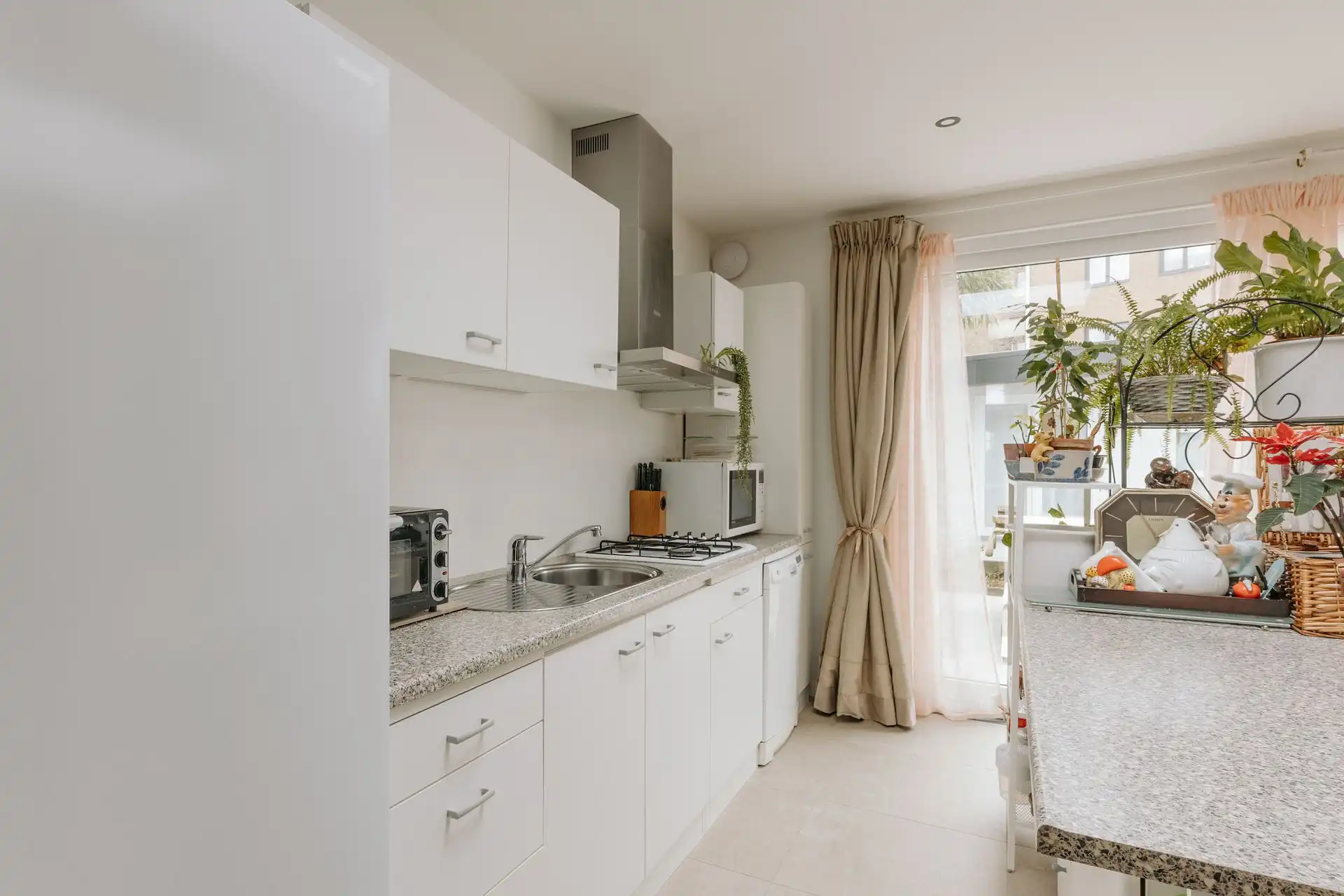 Instapklare gezinswoning met zonnige tuin foto 7