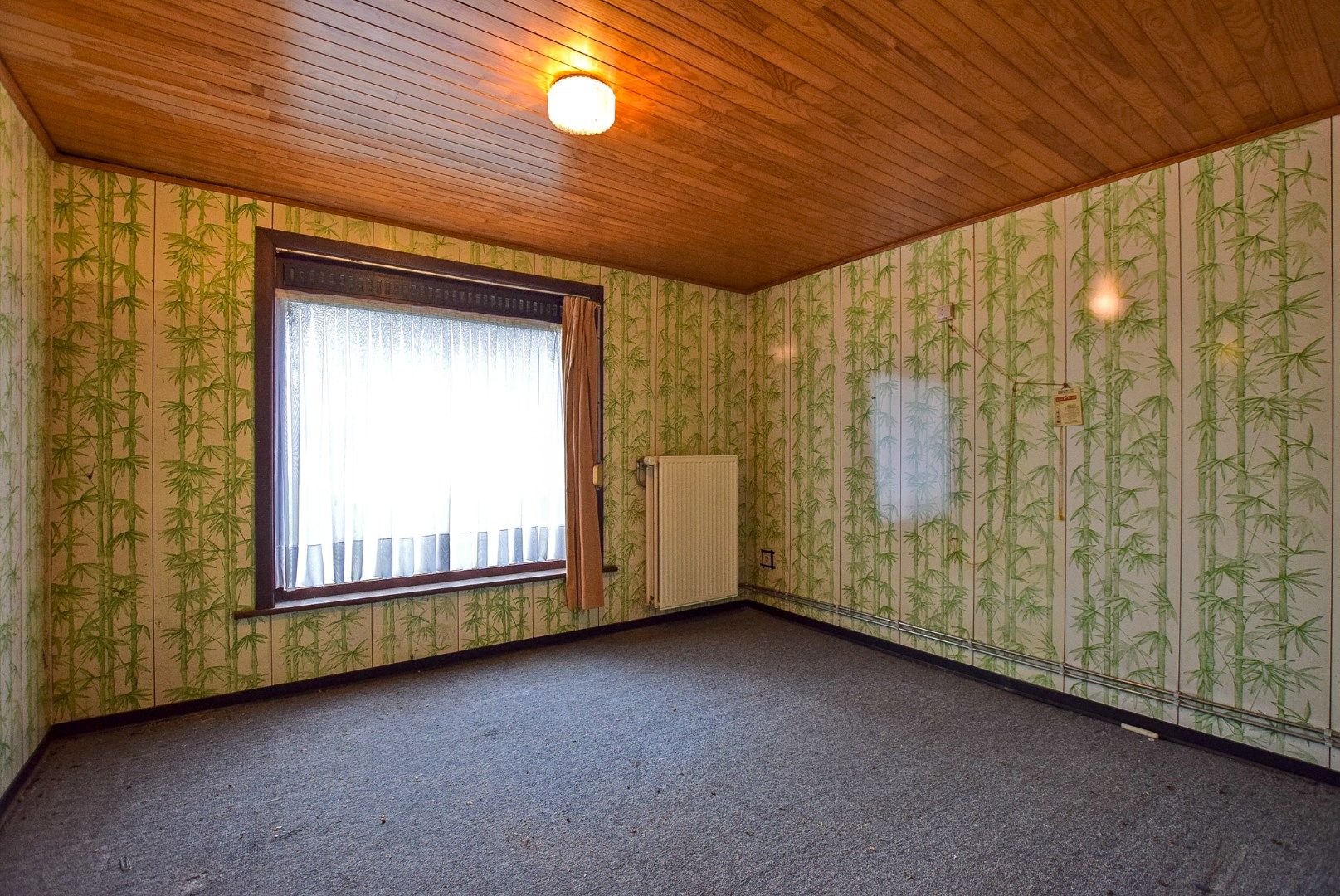 Gezellige woning te koop in Hoogstade met zongerichte tuin en zijtoegang. foto 15