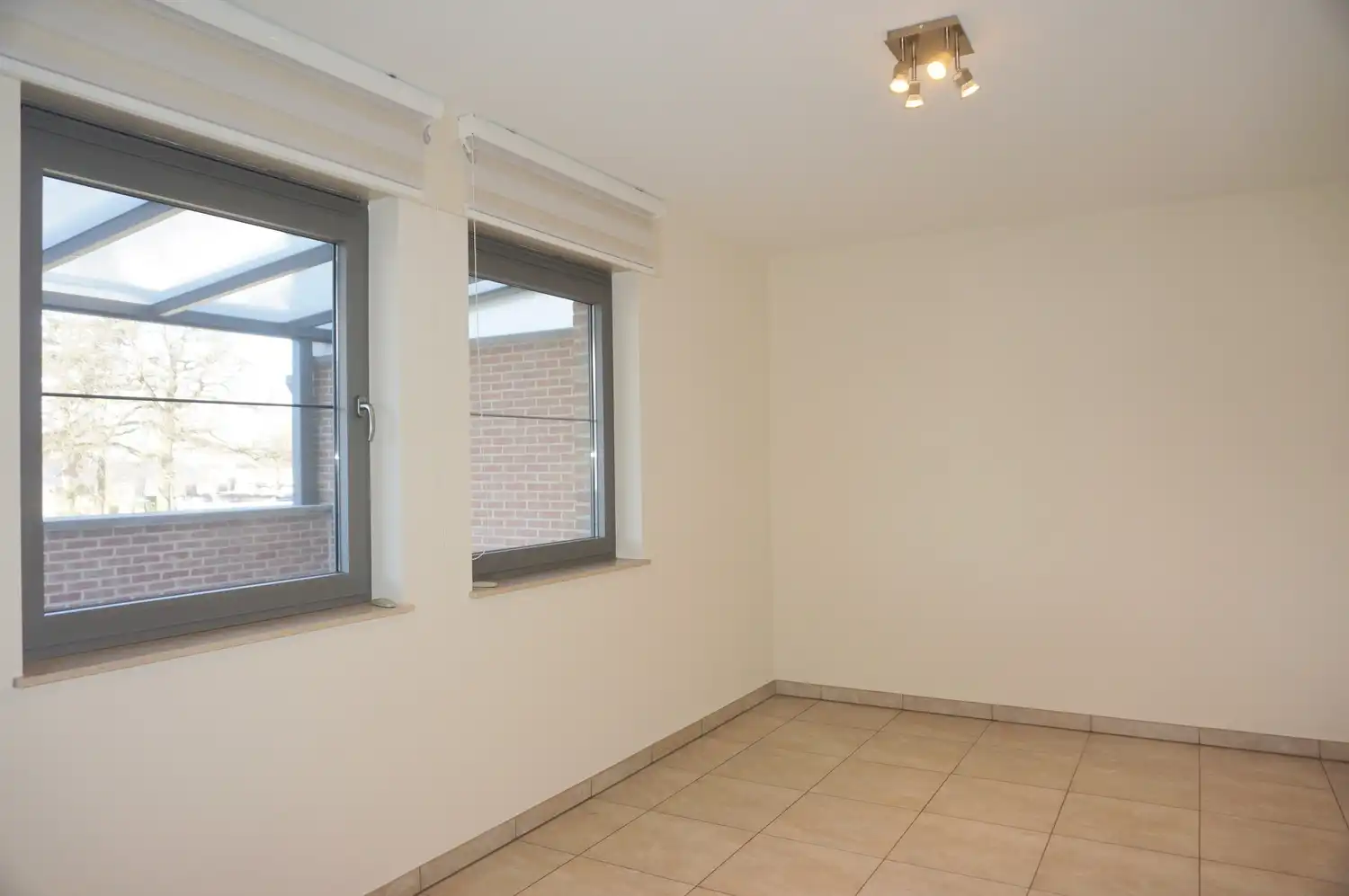 Ruim appartement van 110 m² met 2 slaapkamers, lift, 2 autostaanplaatsen en twee terrassen in het centrum van Paal foto 9