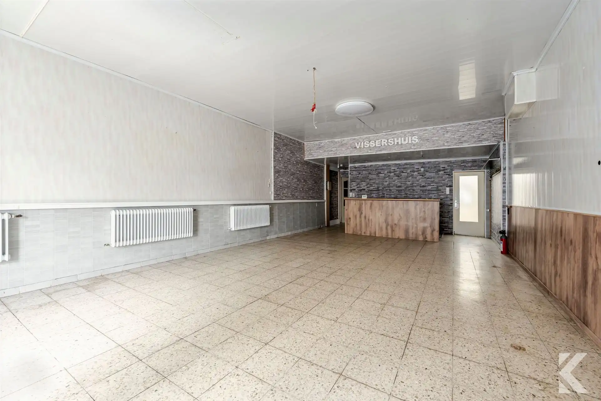 Te renoveren woning met veel potentieel en ruime zolder foto 2