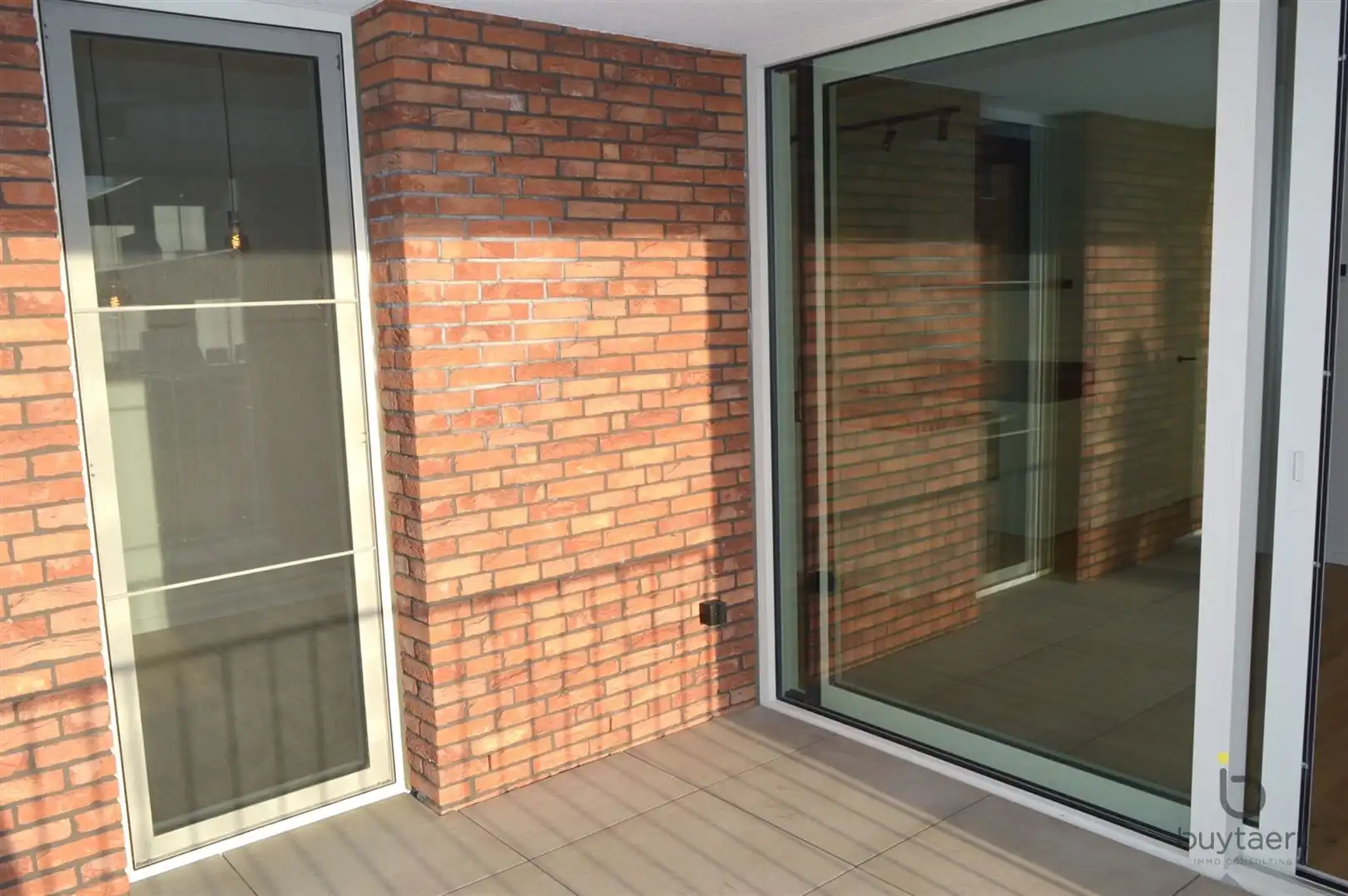 Nieuwbouw appartement met ruim terras en parking te Zoersel. foto 18