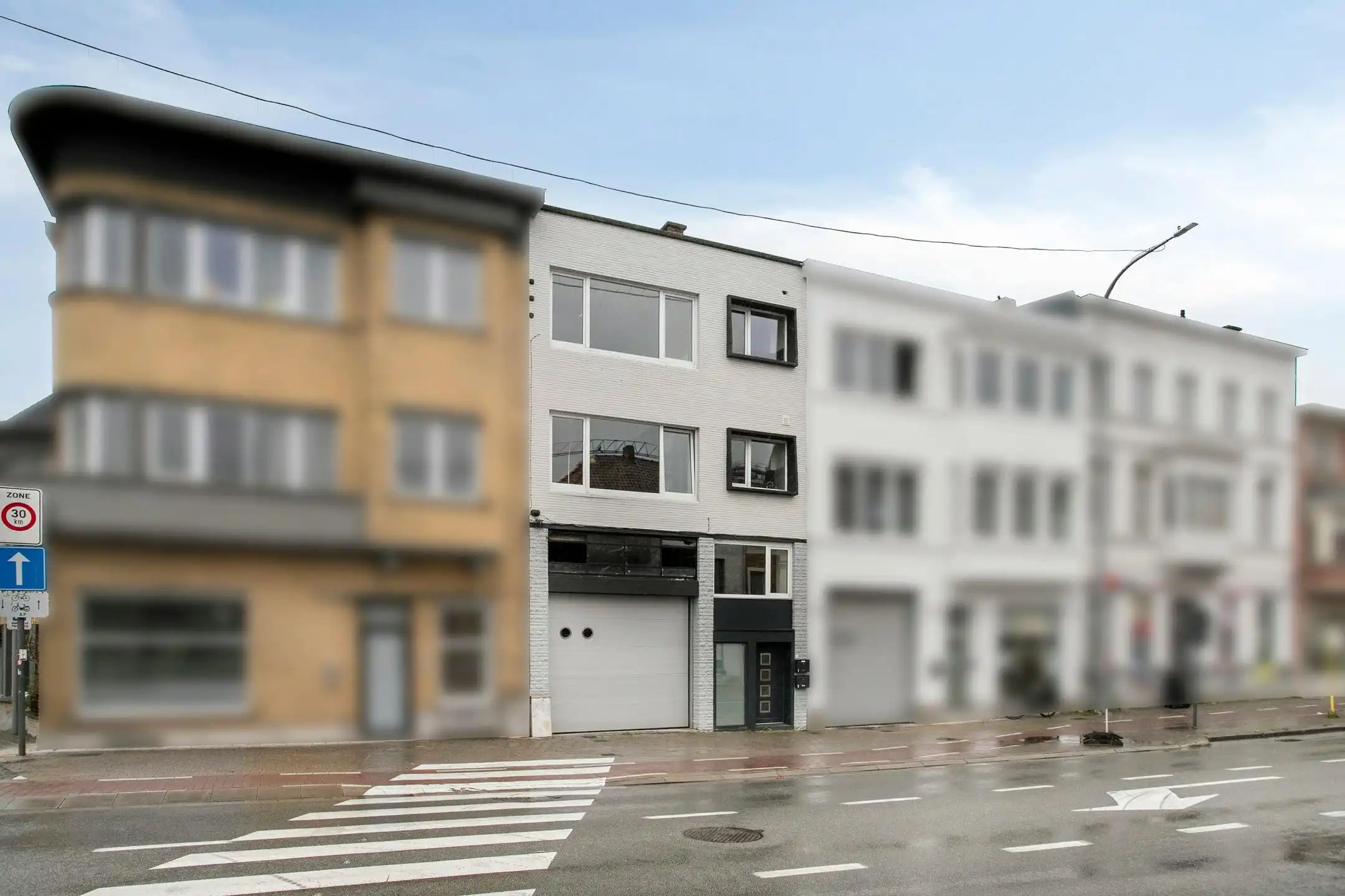 Unieke eigendom met loods en 2 gerenoveerde appartementen  foto 14