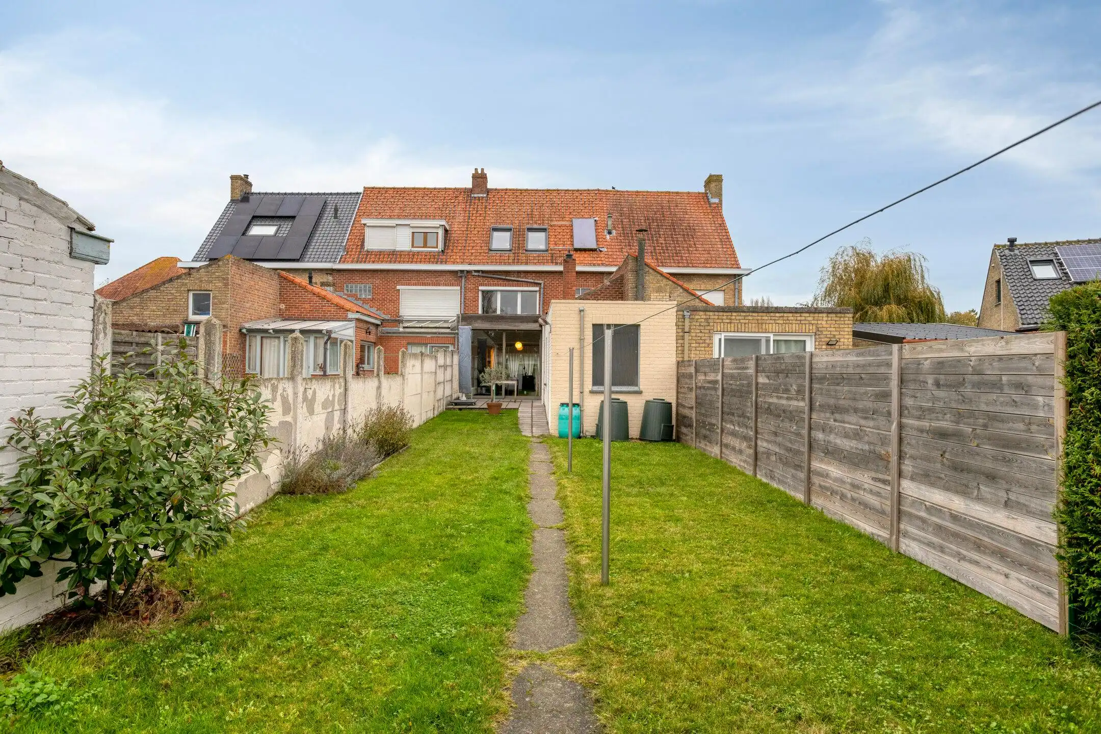 Instapklare woning met 3 slaapkamers, 2 badkamers, zuidgerichte tuin en garage. foto 25
