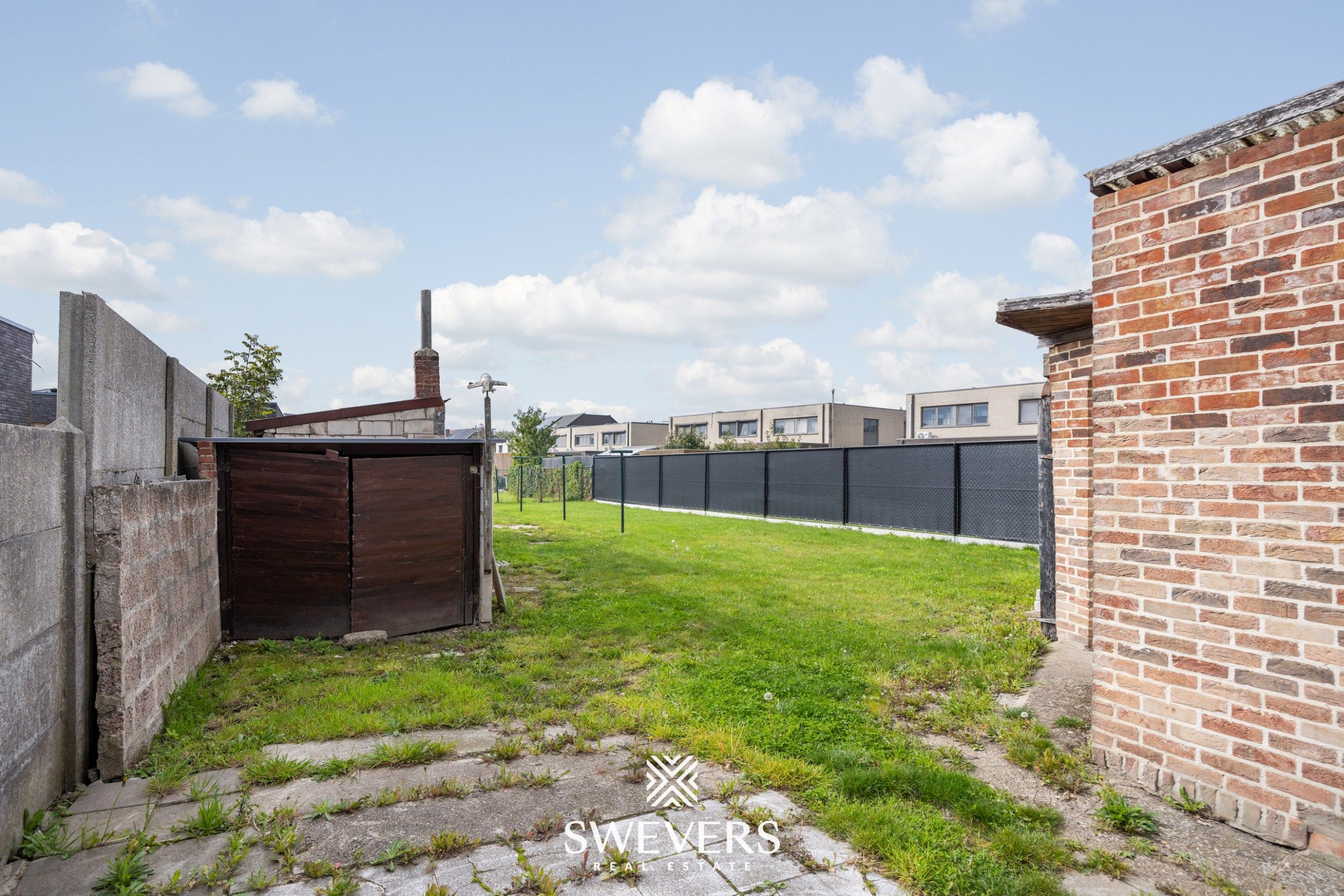 Te renoveren open bebouwing met groot perceel in rustige straat in Bilzen foto 31