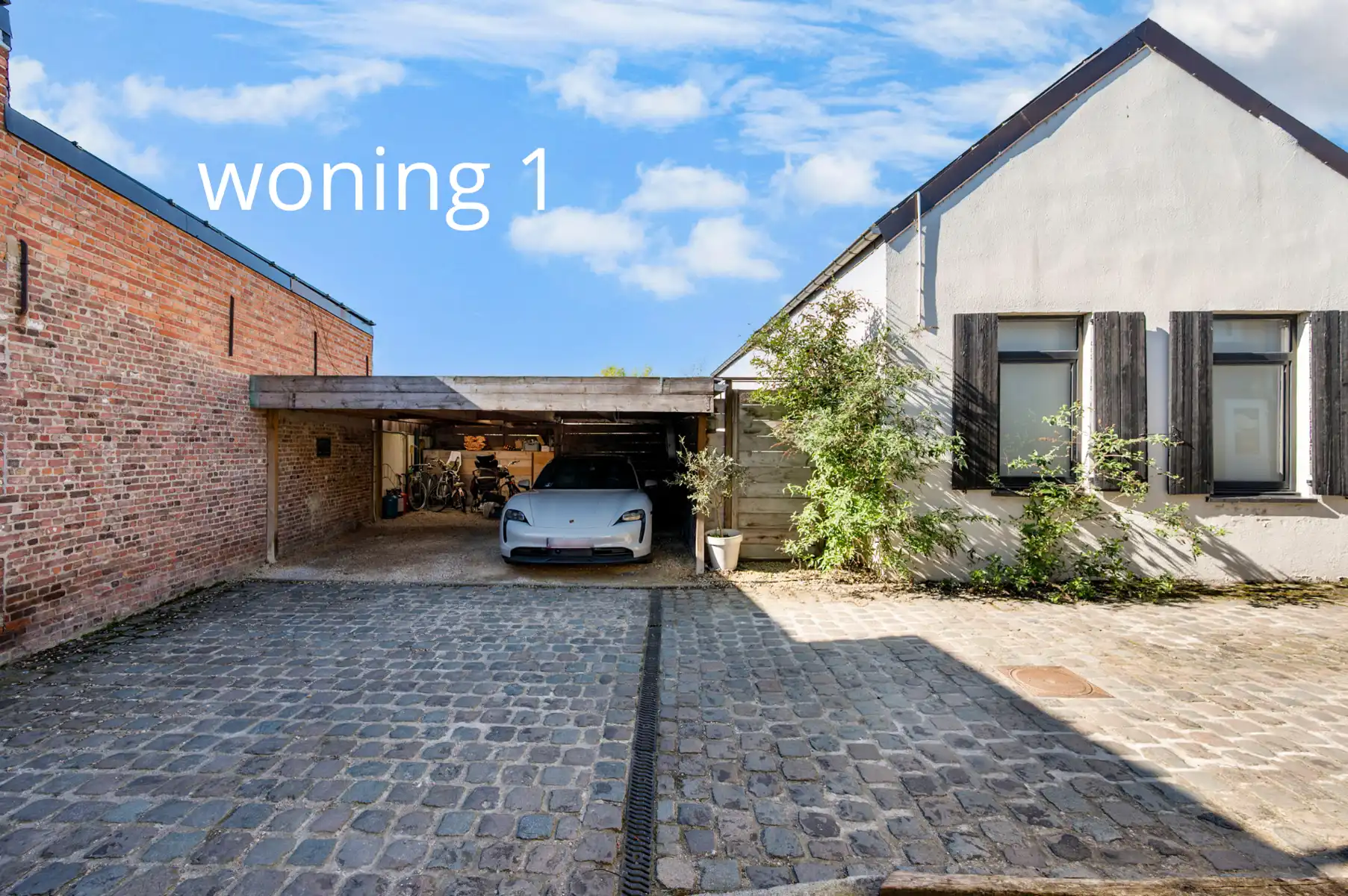Uniek perceel met 2 volwaardige woningen en gedeelde tuin!  foto 4