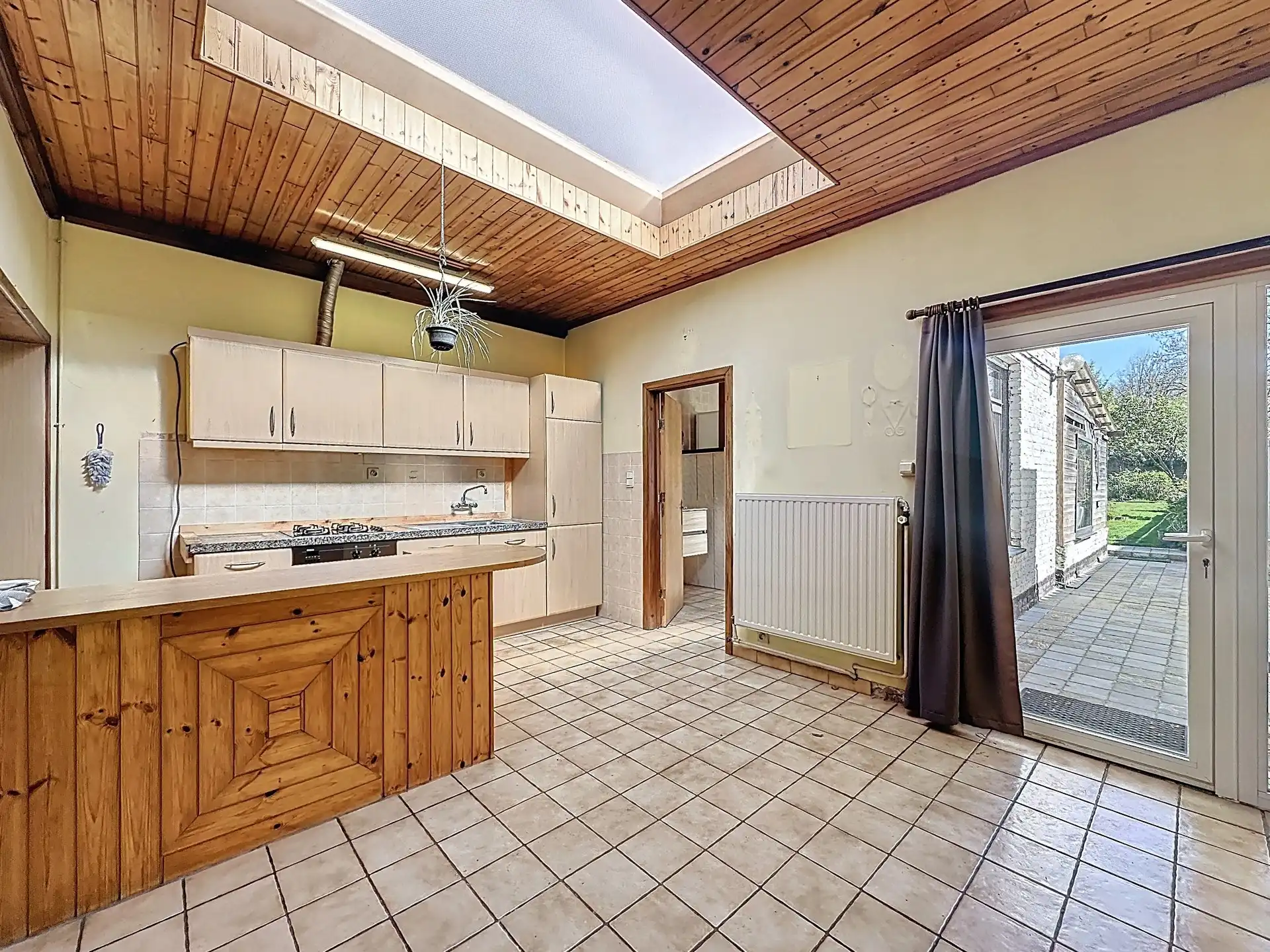 Charmante woning met 3 slaapkamers, oprit en prachtige tuin in hartje Sint-Niklaas foto 4