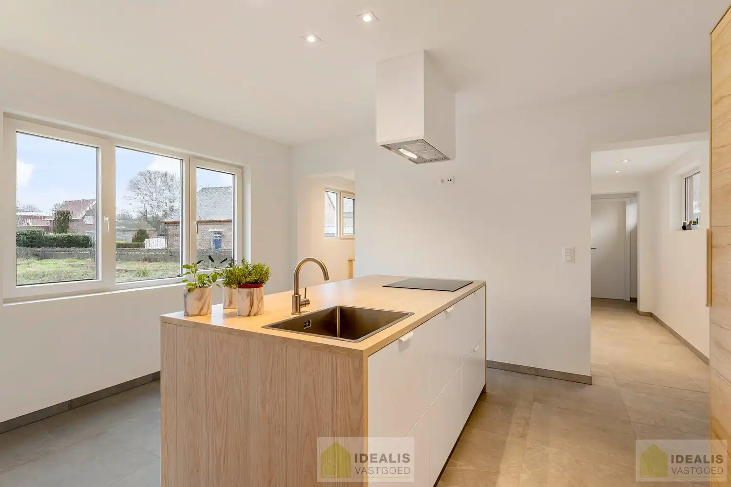 IDEALIS VASTGOED – Schitterend volledig vernieuwde woning met een heerlijke open leefruimte, luxe keuken, 3 ruime slaapkamers, twee badkamers én een ruime wasplaats! Dit heerlijke huis bevindt zich op een perceel van maar liefst 7a 94ca vlak bij het centrum van Eksel - EEN MUST VISIT! - foto 5