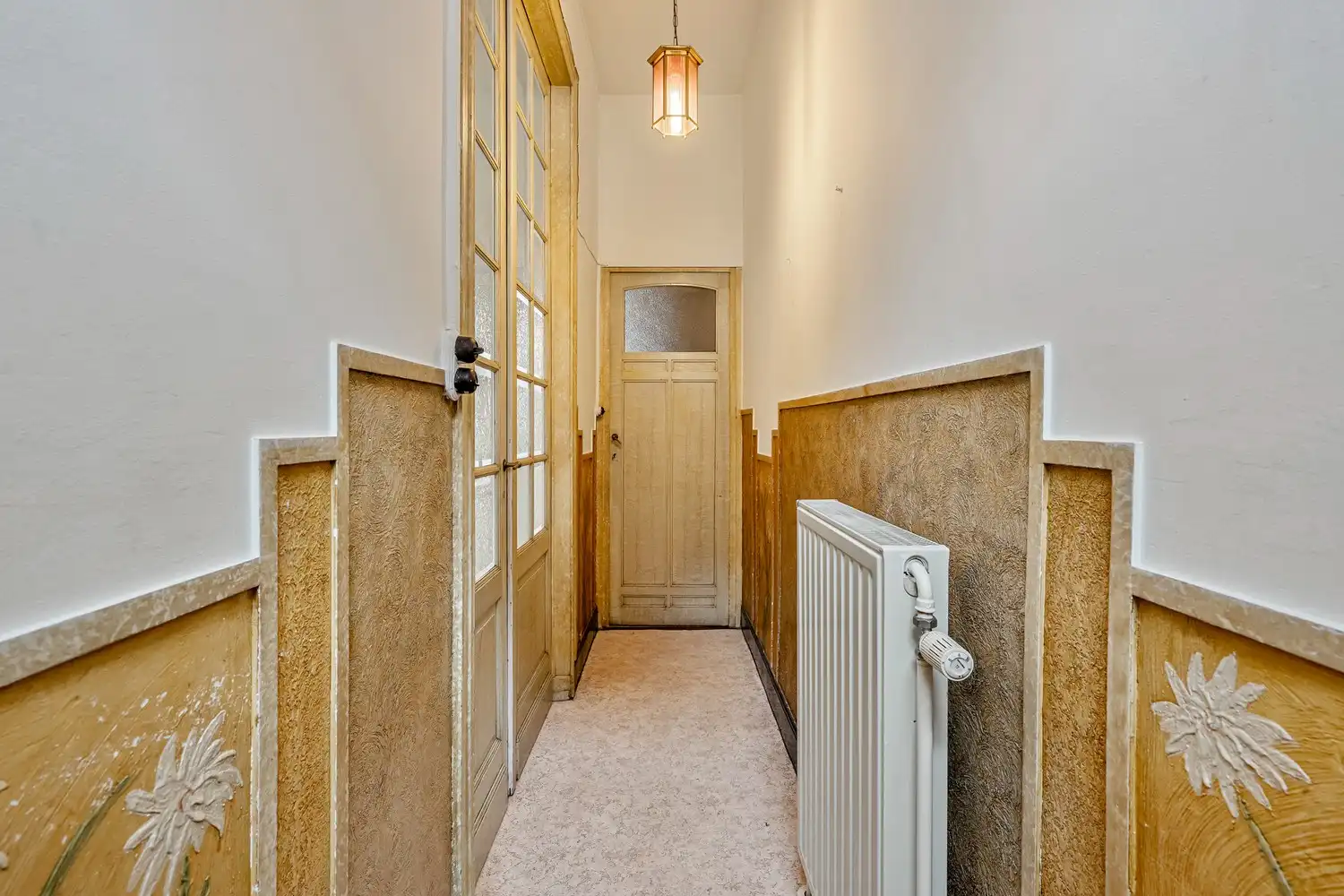 Goed gelegen rijwoning met 2 slaapkamers en een af te werken zolderruimte te Leuven! foto 2
