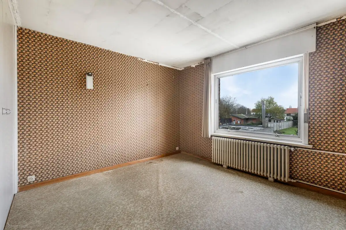 Te renoveren woning met 4 slaapkamers en garage! foto 12