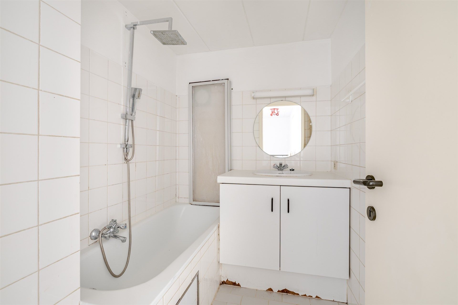 Opbrengsteigendom bestaande uit 7 appartementen + 1 kantoorruimte + 13 overdekte autostaanplaatsen foto 7