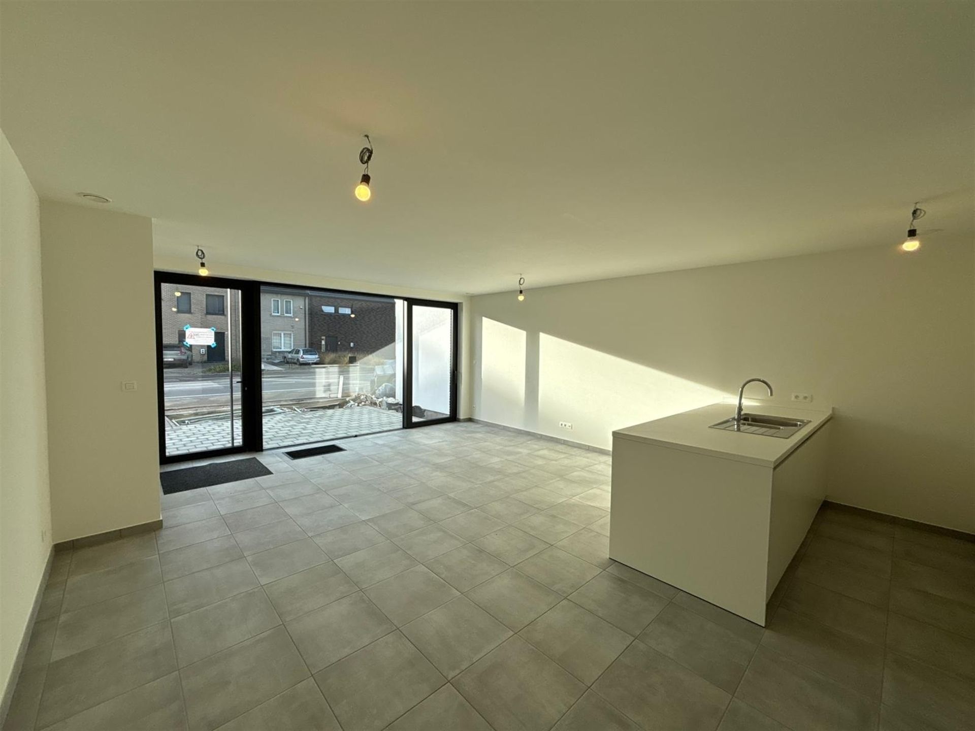 Modern gelijkvloers appartement met private tuin en ruime terrassen in Asse! foto 3
