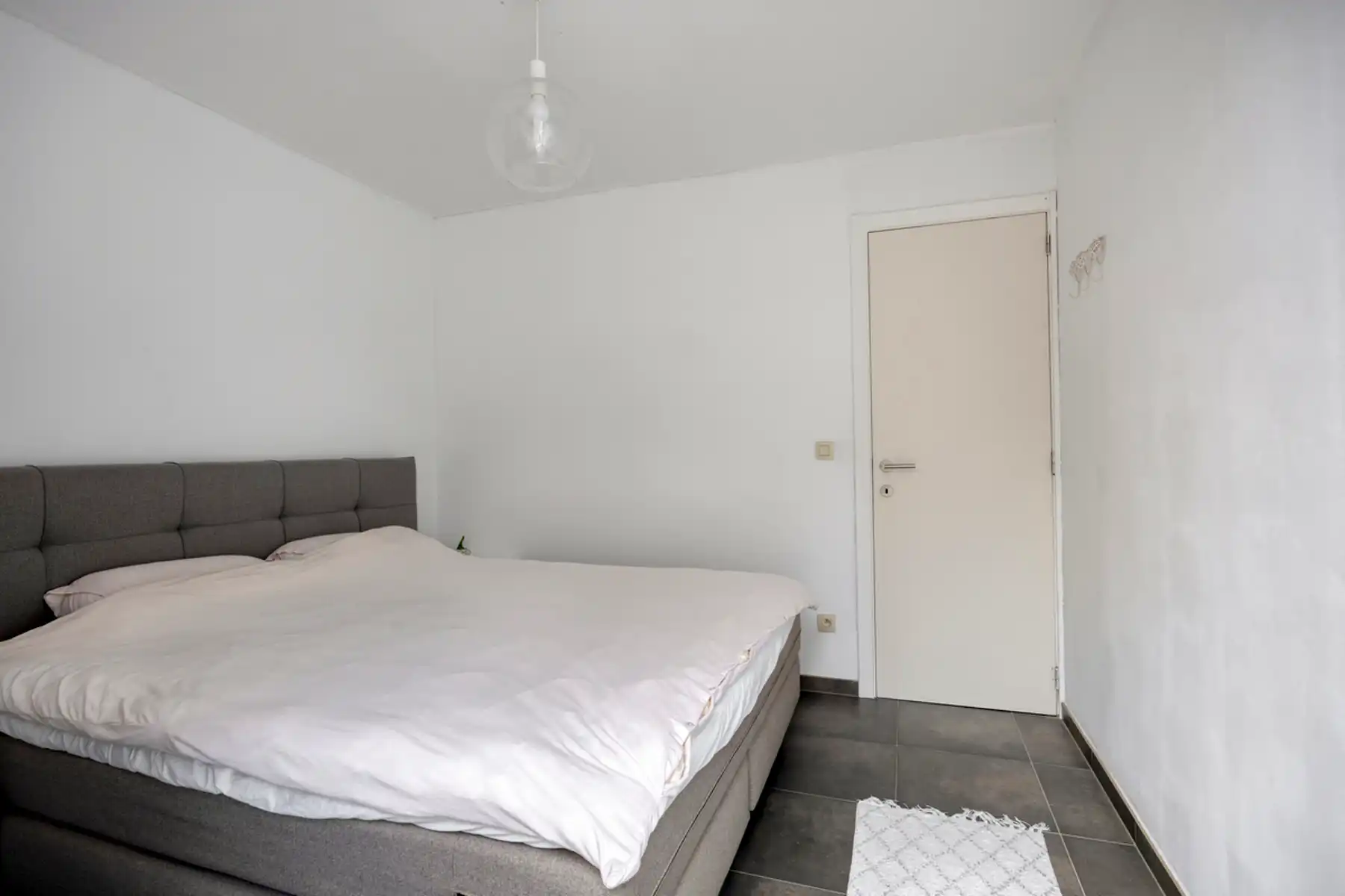Energiezuinig appartement + autostaanplaats + kelder-berging foto 15