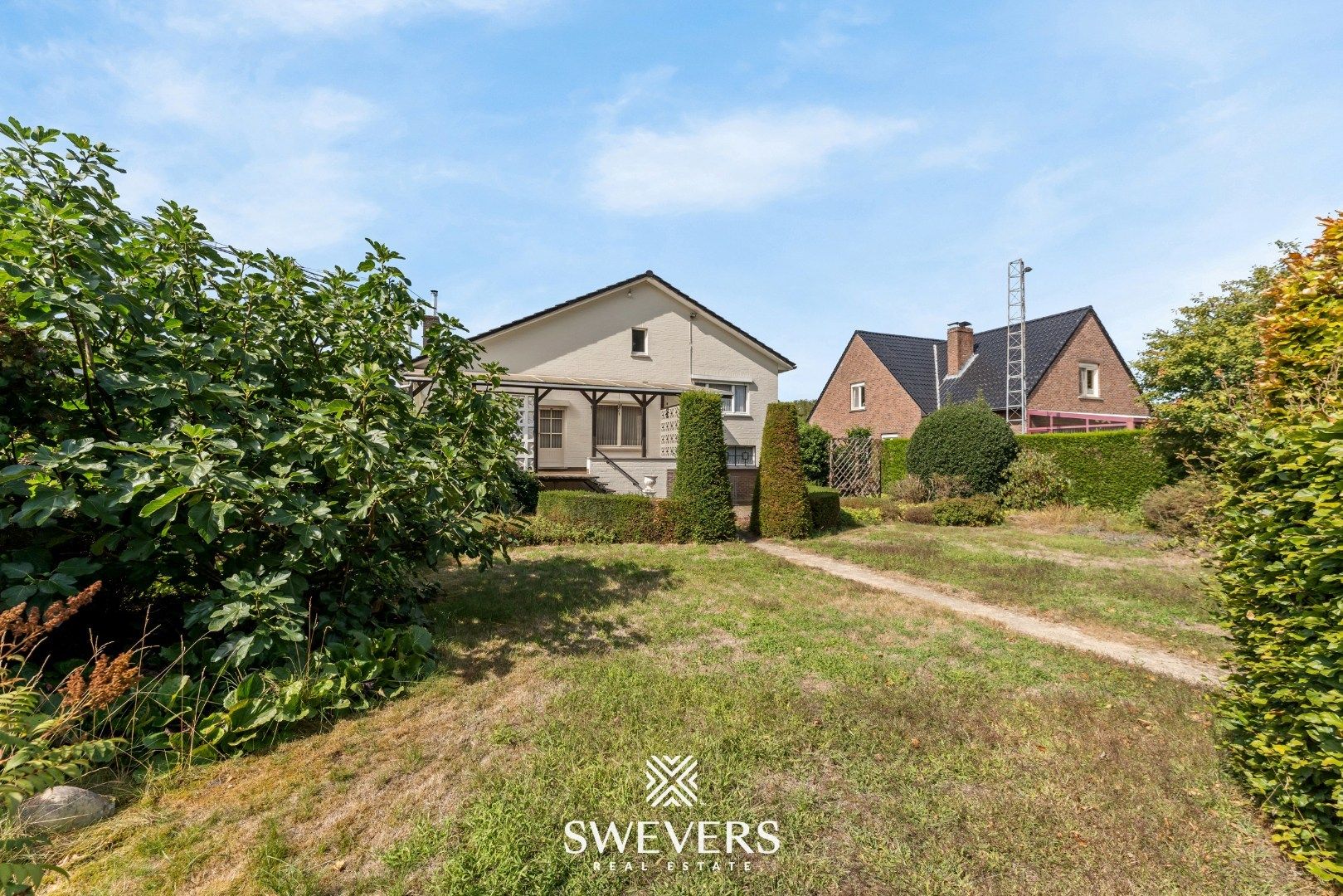 Ruime gezinswoning met 5 SLPK en veel potentieel in groene omgeving foto 30