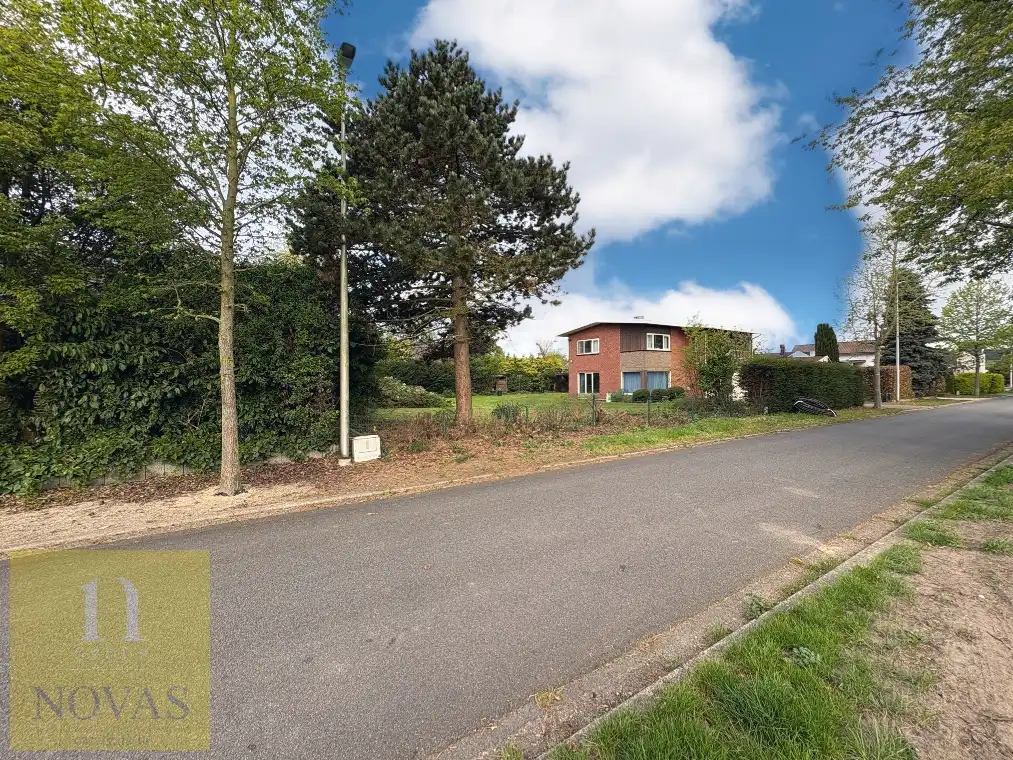 Aan het centrum, bouwgrond van 6are09ca, 18m breed, ca 35m diep foto 4