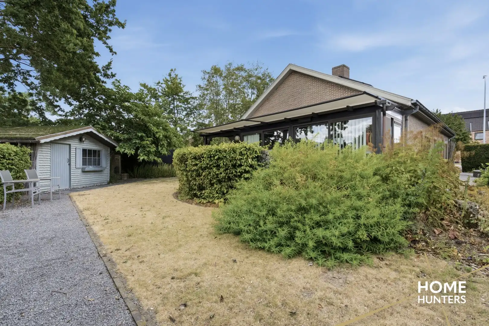 Alleenstaande woning met prachtige tuin en tal van extra troeven in een rustige wijk te Wervik foto 5