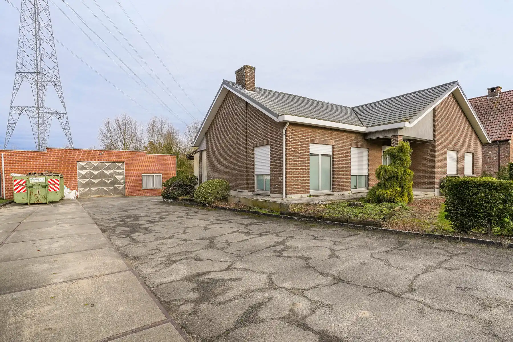 Vrijstaande woning mét magazijn op een perceel van 2277m² te Bornem foto 2