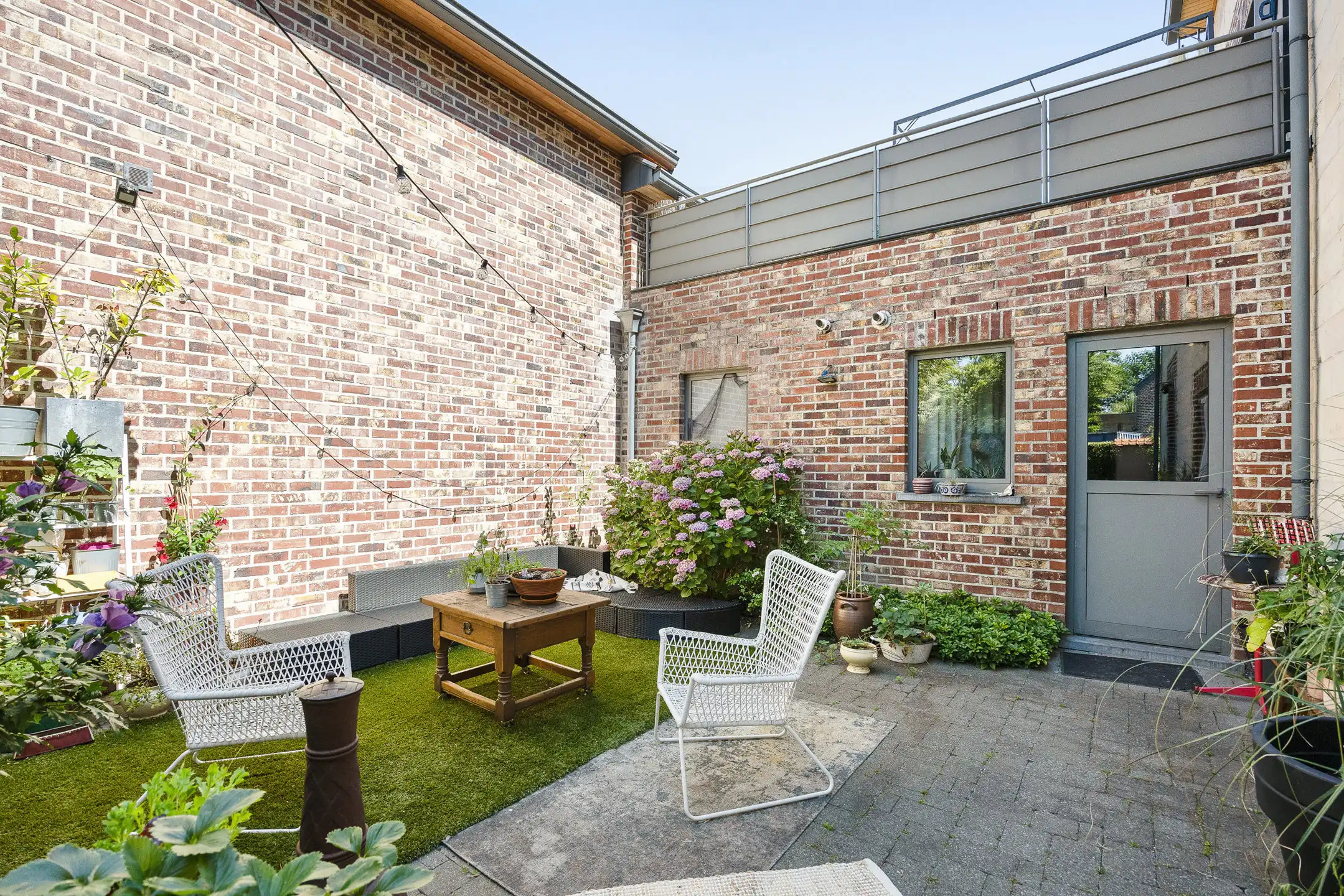 Gelijkvloers appartement met terras/tuin en garage foto 19