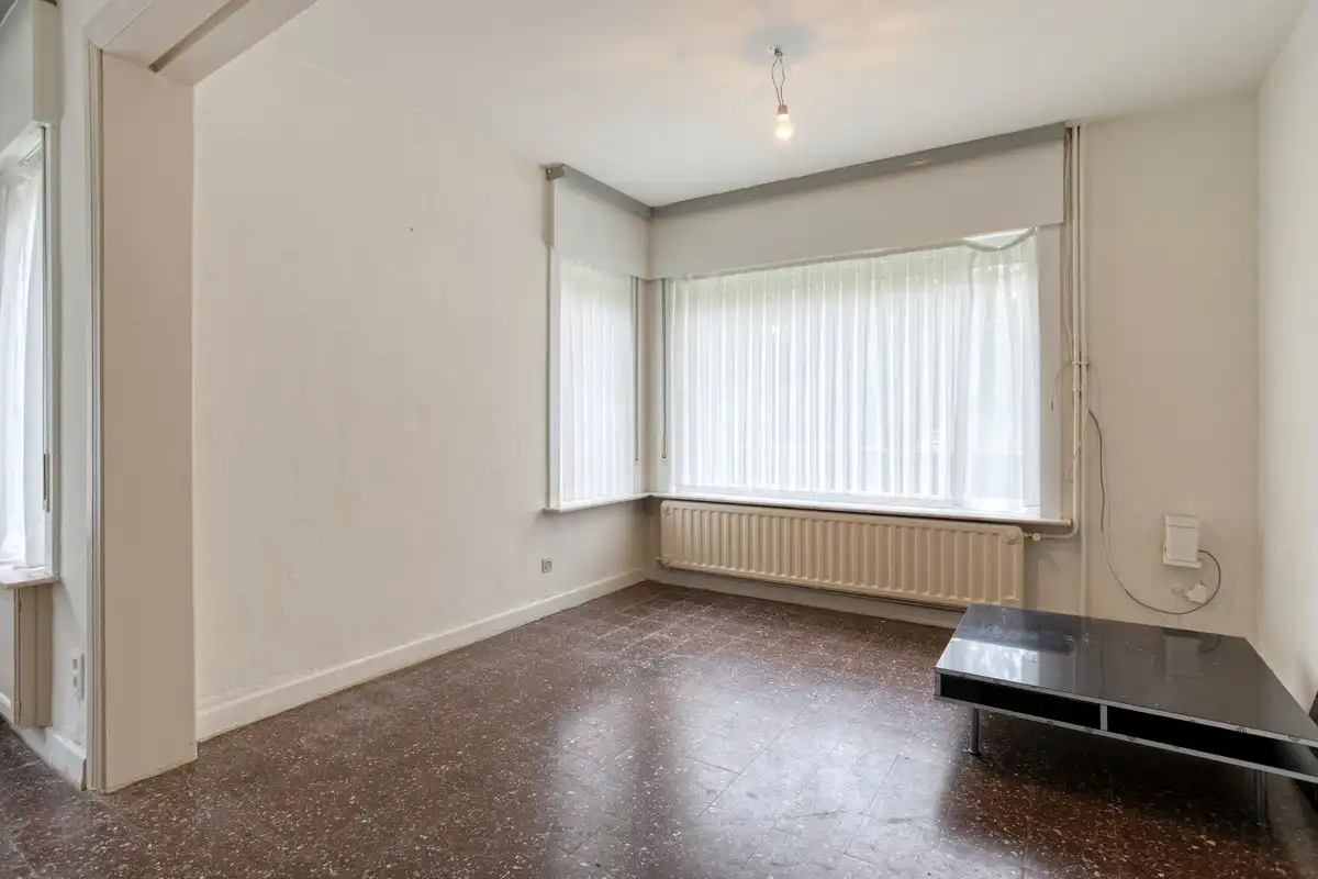 Op te frissen gelijkvloerse woning met 1 slaapkamer en garage! foto 4
