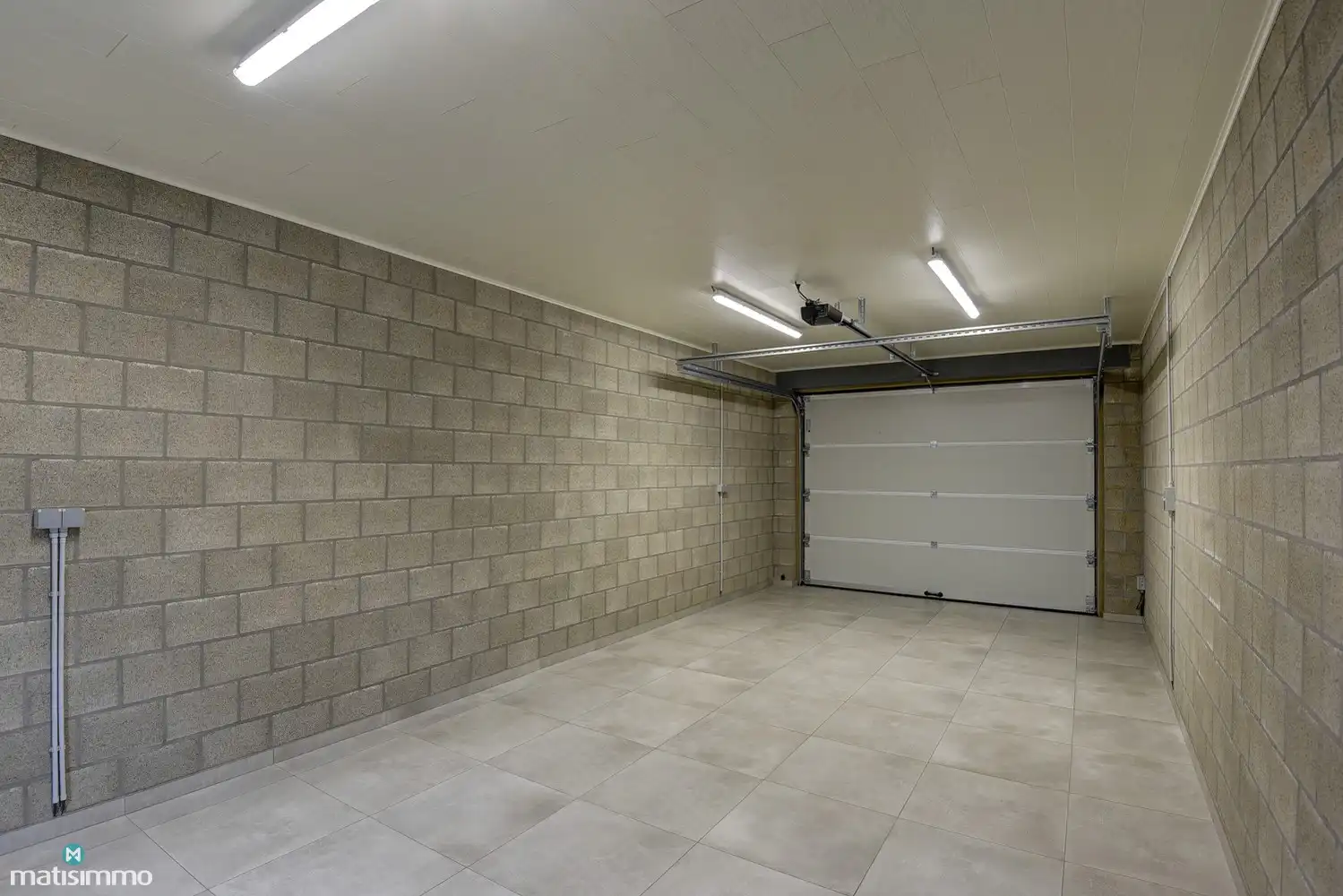 RUIM NIEUWBOUW APPARTEMENT MET 2 SLAAPKAMERS, TERRAS, GARAGE, AUTOSTAANPLAATS EN KELDERBERGING TE BEVERST foto 26