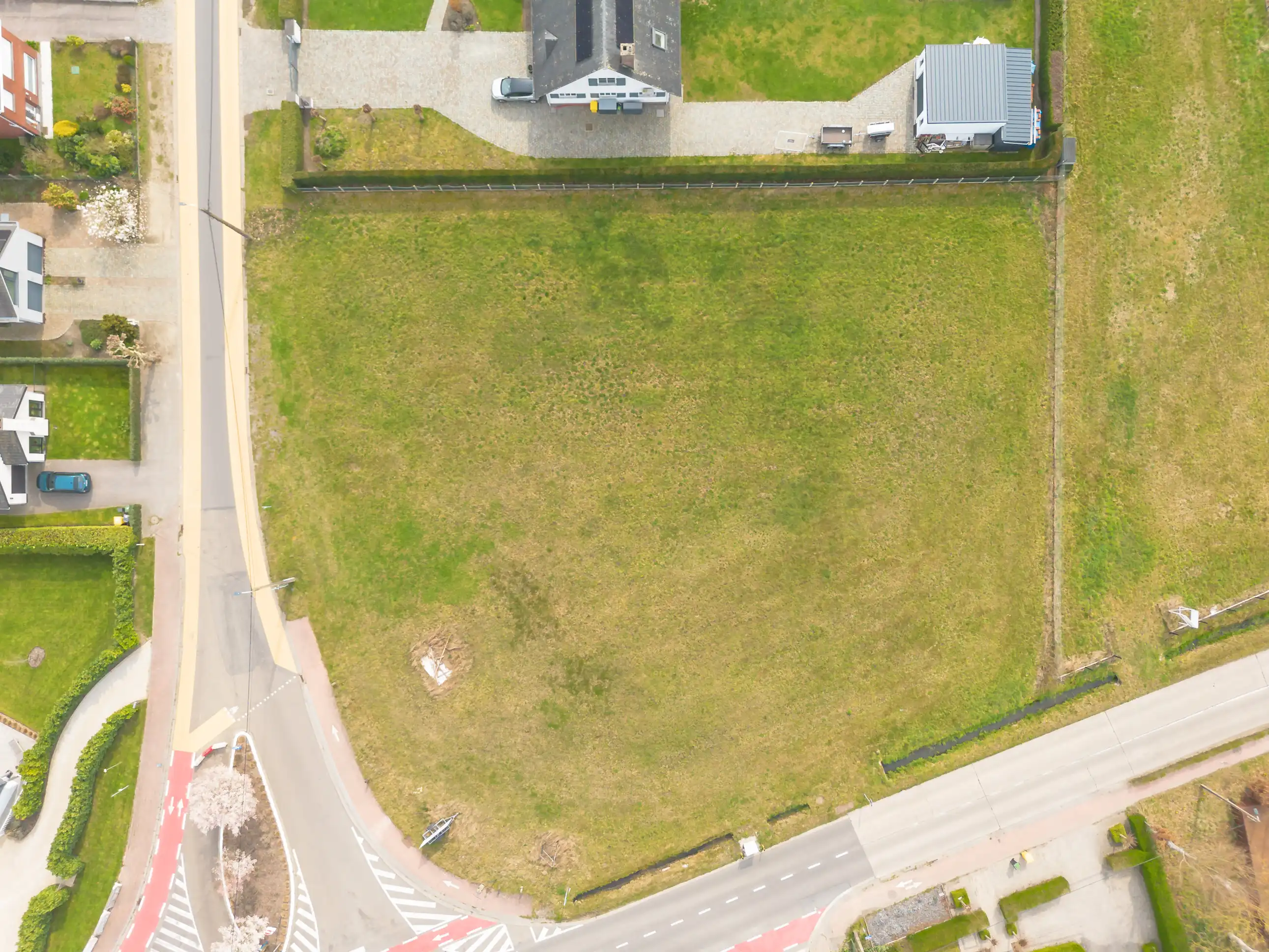 Ruime bouwgrond van 18 are in groene omgeving te Rijmenam foto 8