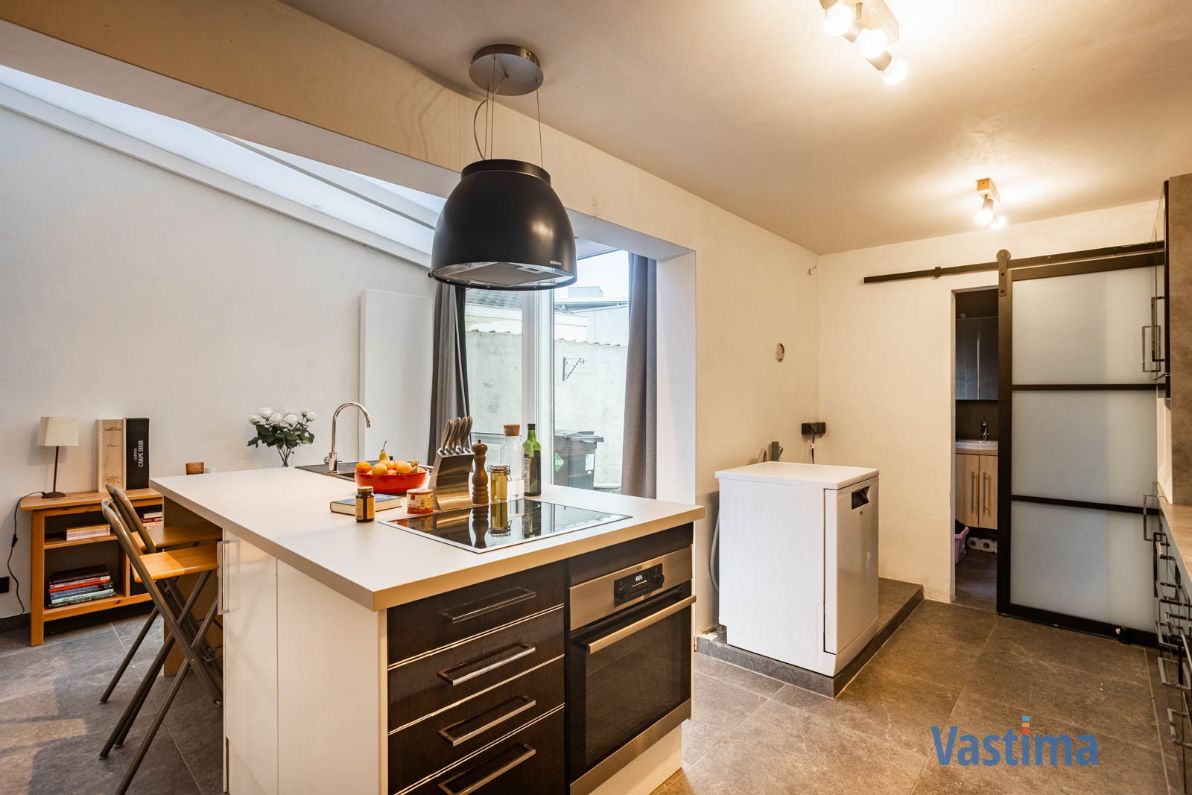 Gerenoveerde gezinswoning met tuin in Erembodegem foto 11