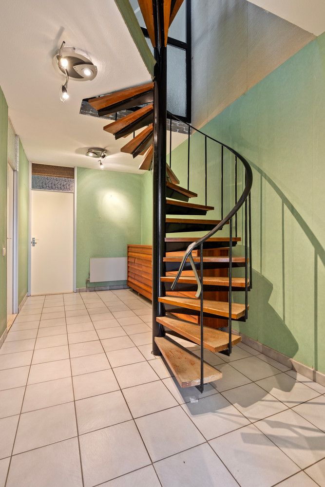 In de wijk 'Langbaanvelden' ligt deze te renoveren bel-étagewoning met 3 tot 4 slks, garage en tuin! foto 5