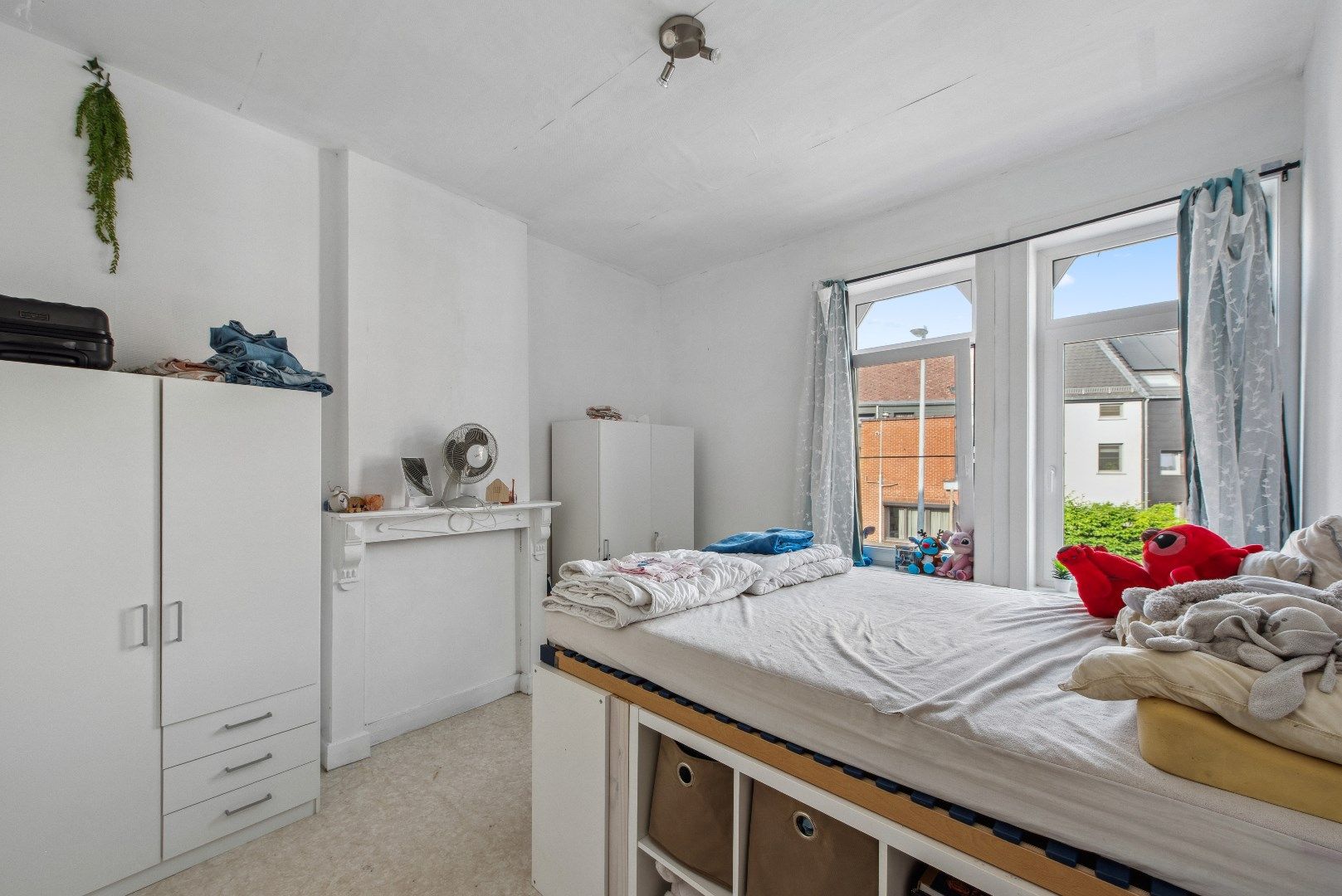 Gezinswoning met 3 slaapkamers en tuin pal in het centrum foto 10