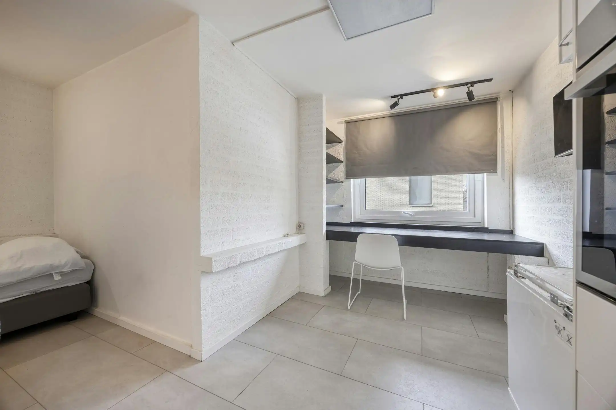 Opbrengsteigendom met 9 studentenkamers en duplex-appartement te Hasselt foto 8