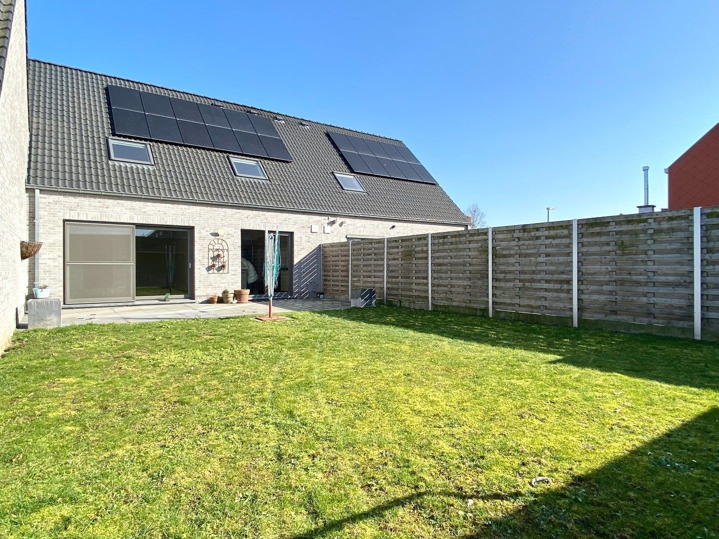 Kindvriendelijke en lichtrijke woning te huur in Wevelgem foto {{pictureIndex}}