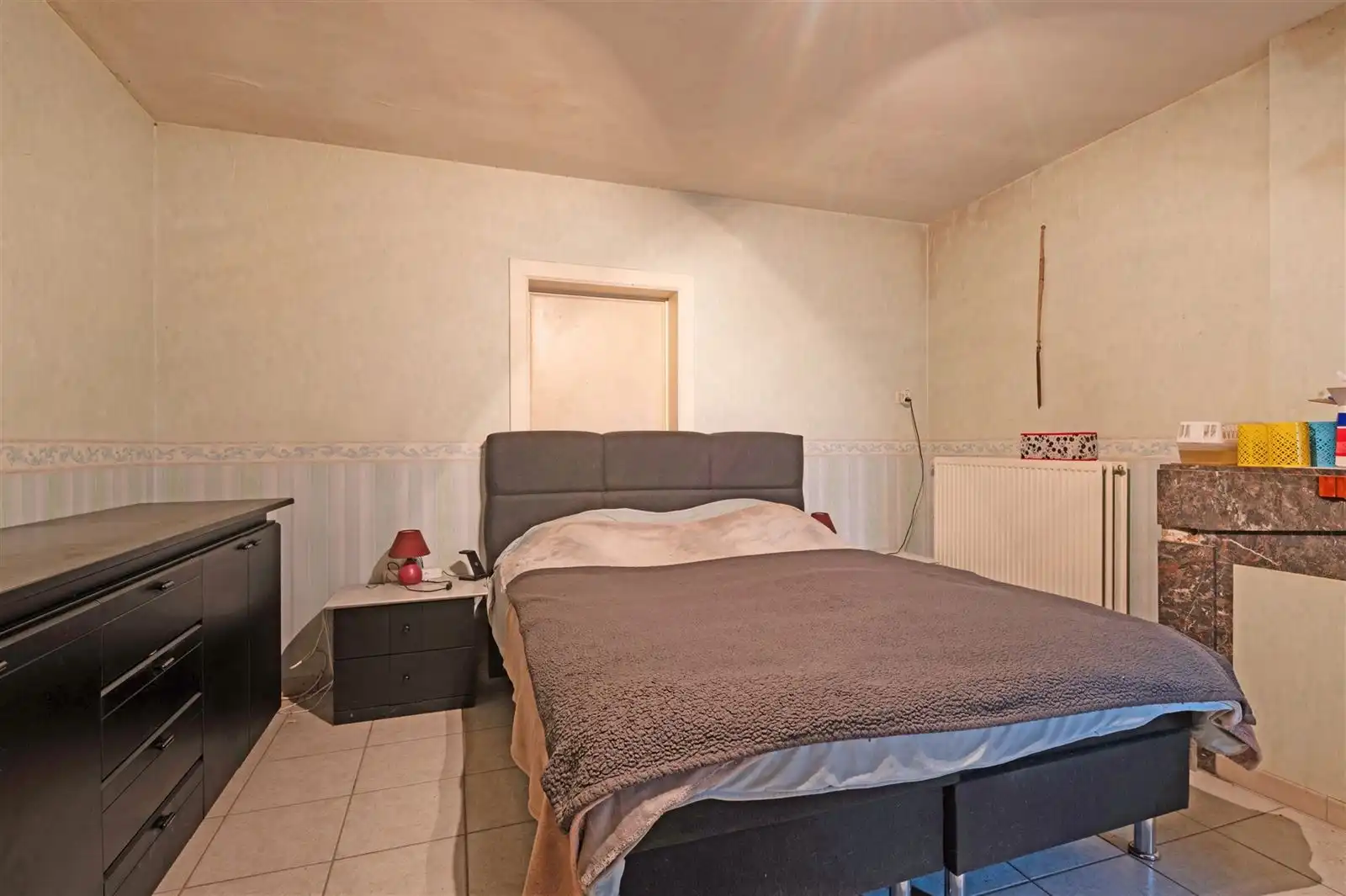 Te renoveren gezinswoning met garage en tuin op 7are55 foto 10