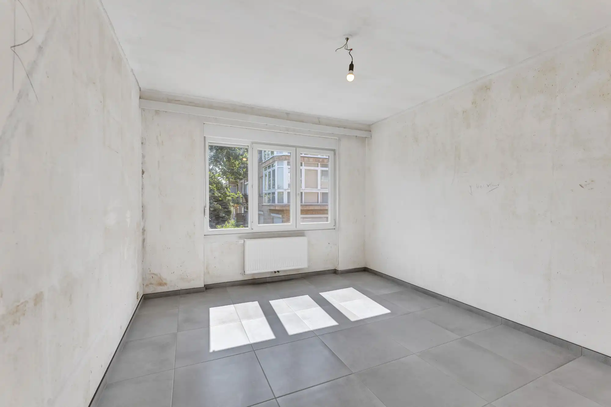 Opbrengsteigendom met 2 appartementen en studio foto 21