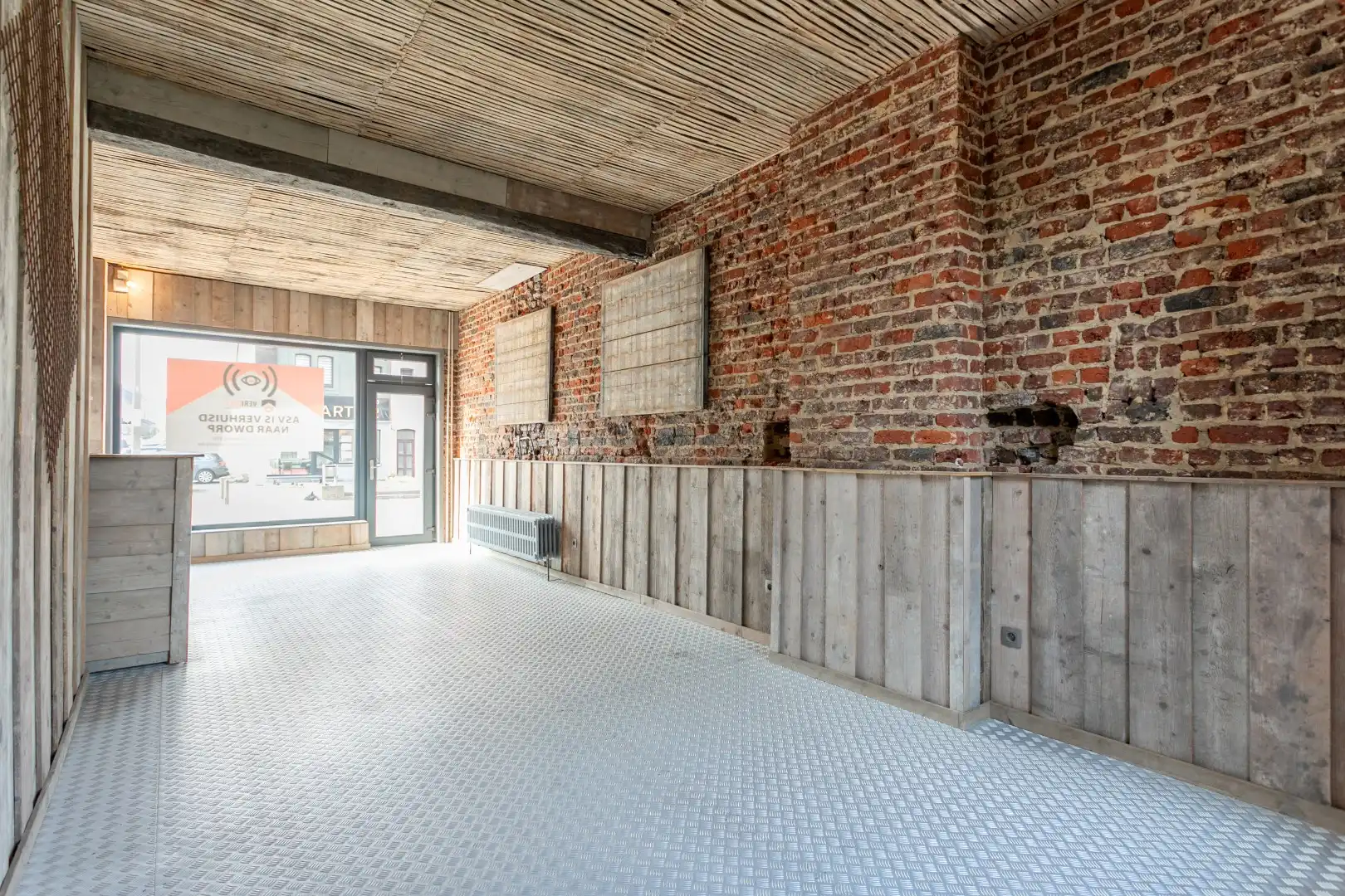 Handelshuis met woongedeelte, garage en tuin te Beersel foto 5