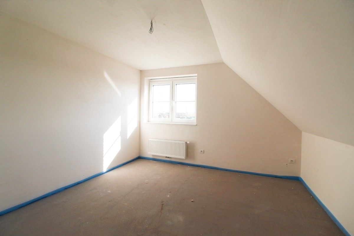 Halfopen nieuwbouwwoning met garage Roeselare foto 8