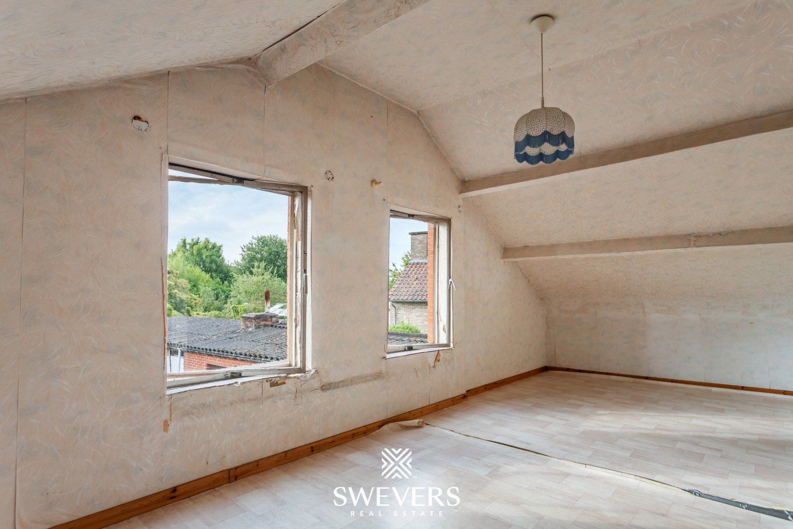 Te renoveren woning met veel potentieel op toplocatie te Diepenbeek foto 13