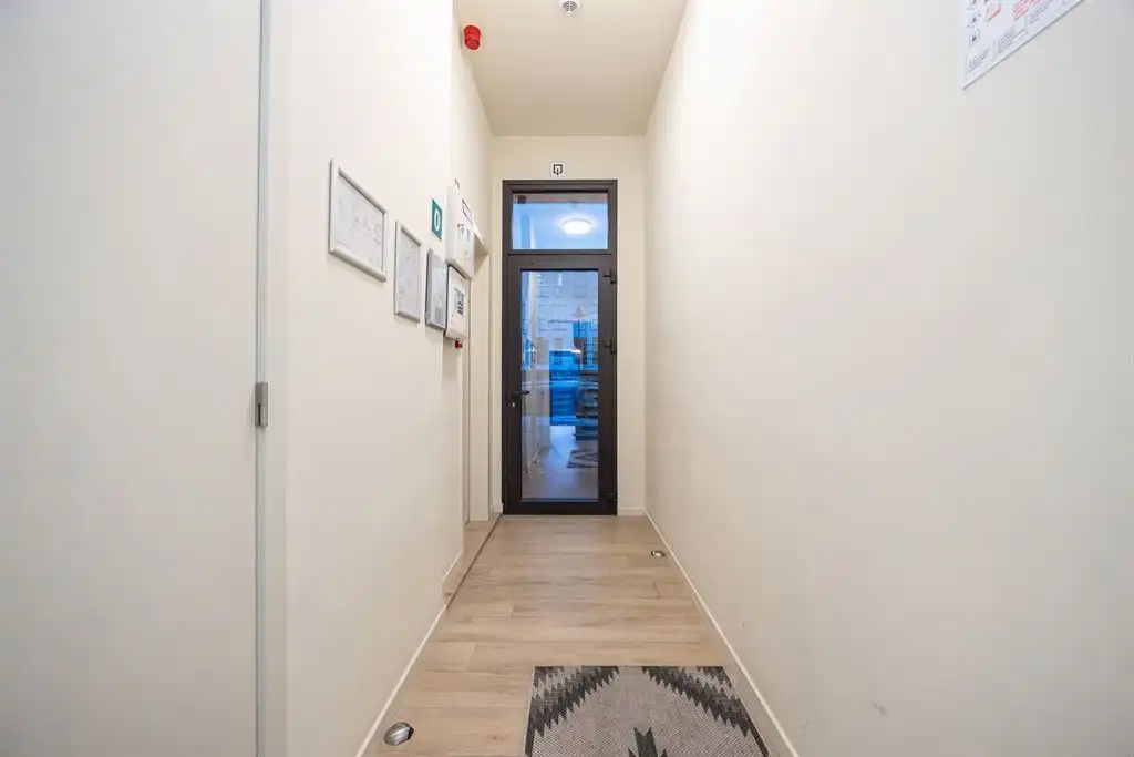 Opbrengsteigendom met 5 gerenoveerde studentenkamers foto 15