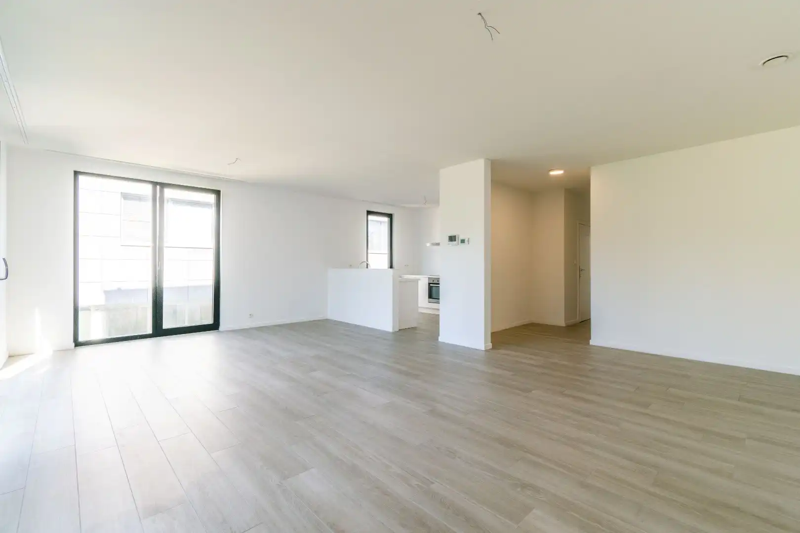 Een ruim (116m²), recent nieuwbouwappartement te Dilbeek! foto 5