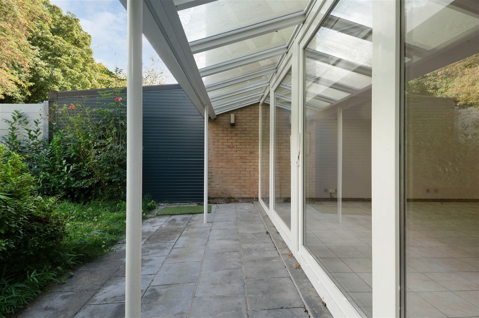 Lichtrijke woning met tuin en garage foto 12