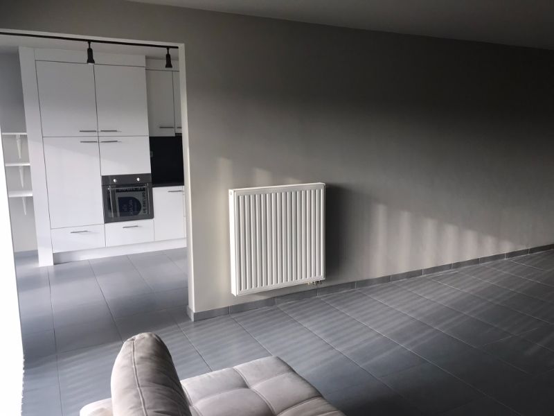 Rustig en zon georiënteerd, instapklaar 2 slk appartement met terras, private garage en dichtbij het Station van Denderleeuw en winkels foto 12