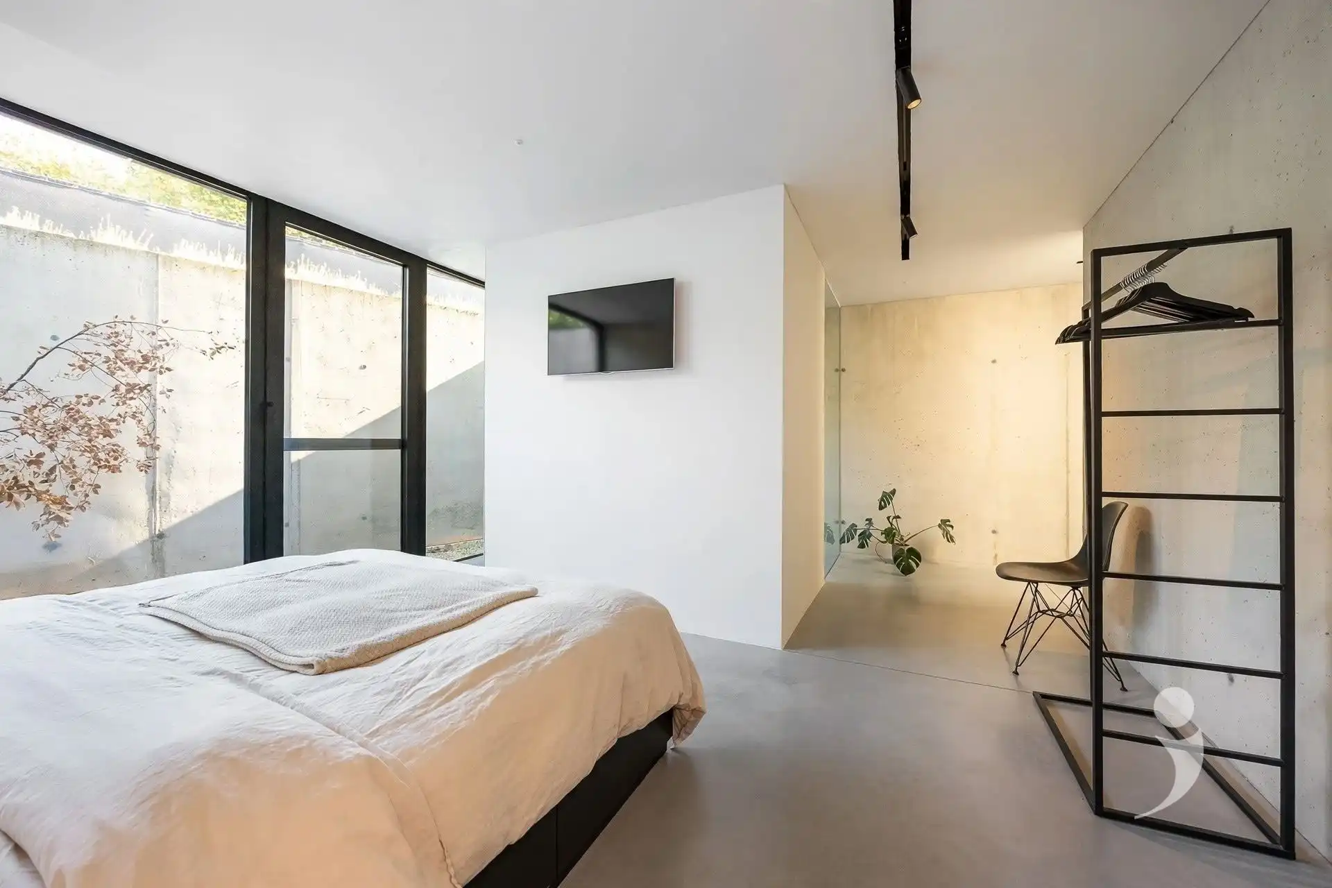 High-end architectenwoning met zwembad en prachtig zicht op de achterliggende weides foto 34