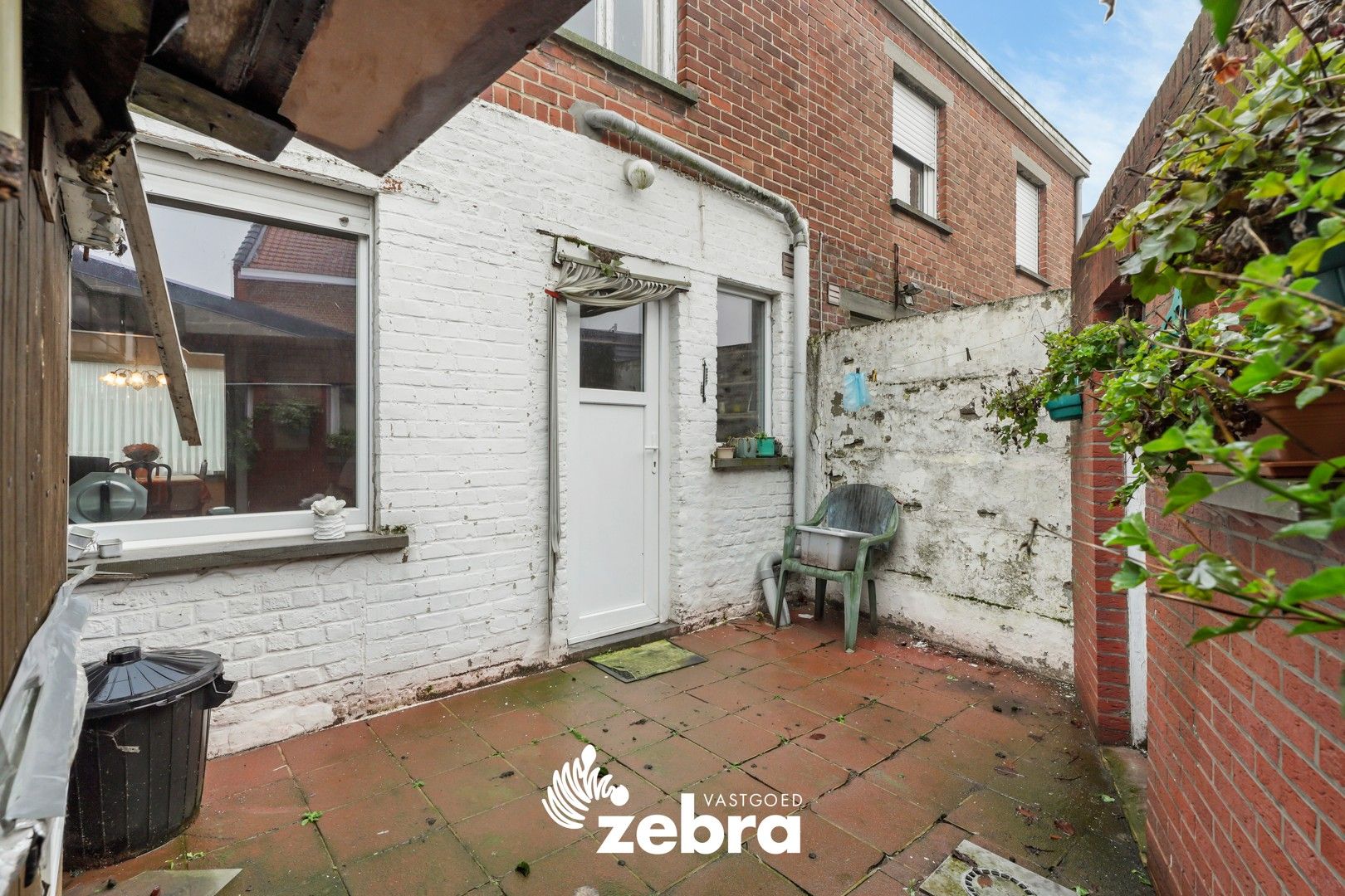Te renoveren stadswoning met aparte garage in centrum Tielt. foto 16