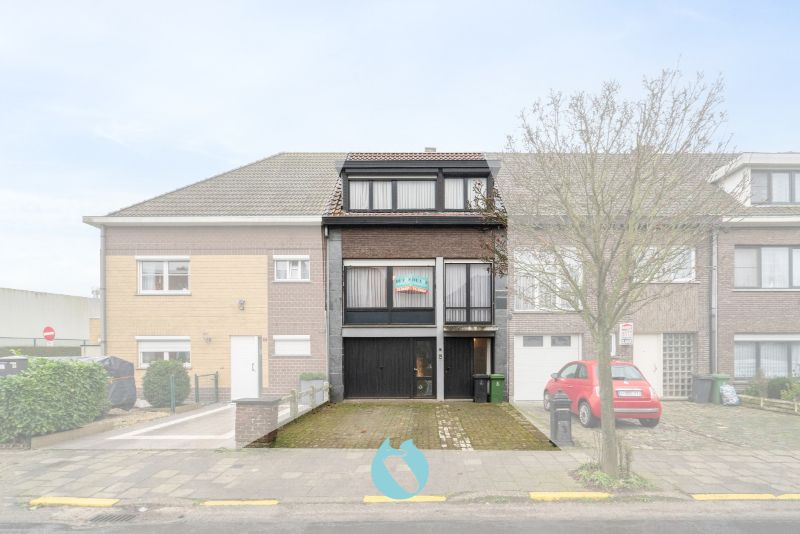 Gezinswoning met 3 slaapkamers, garage en tuin foto 2