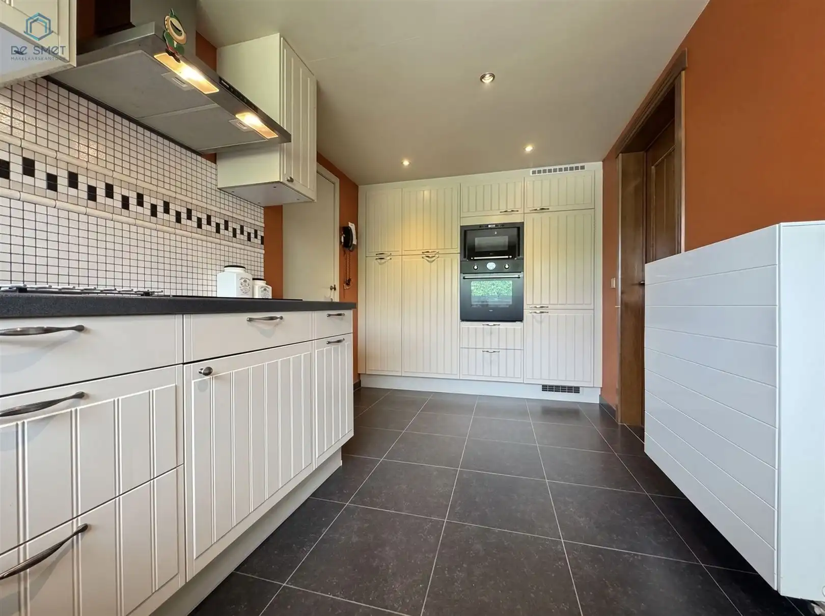 Instapklare woning met garage en tuin foto 7