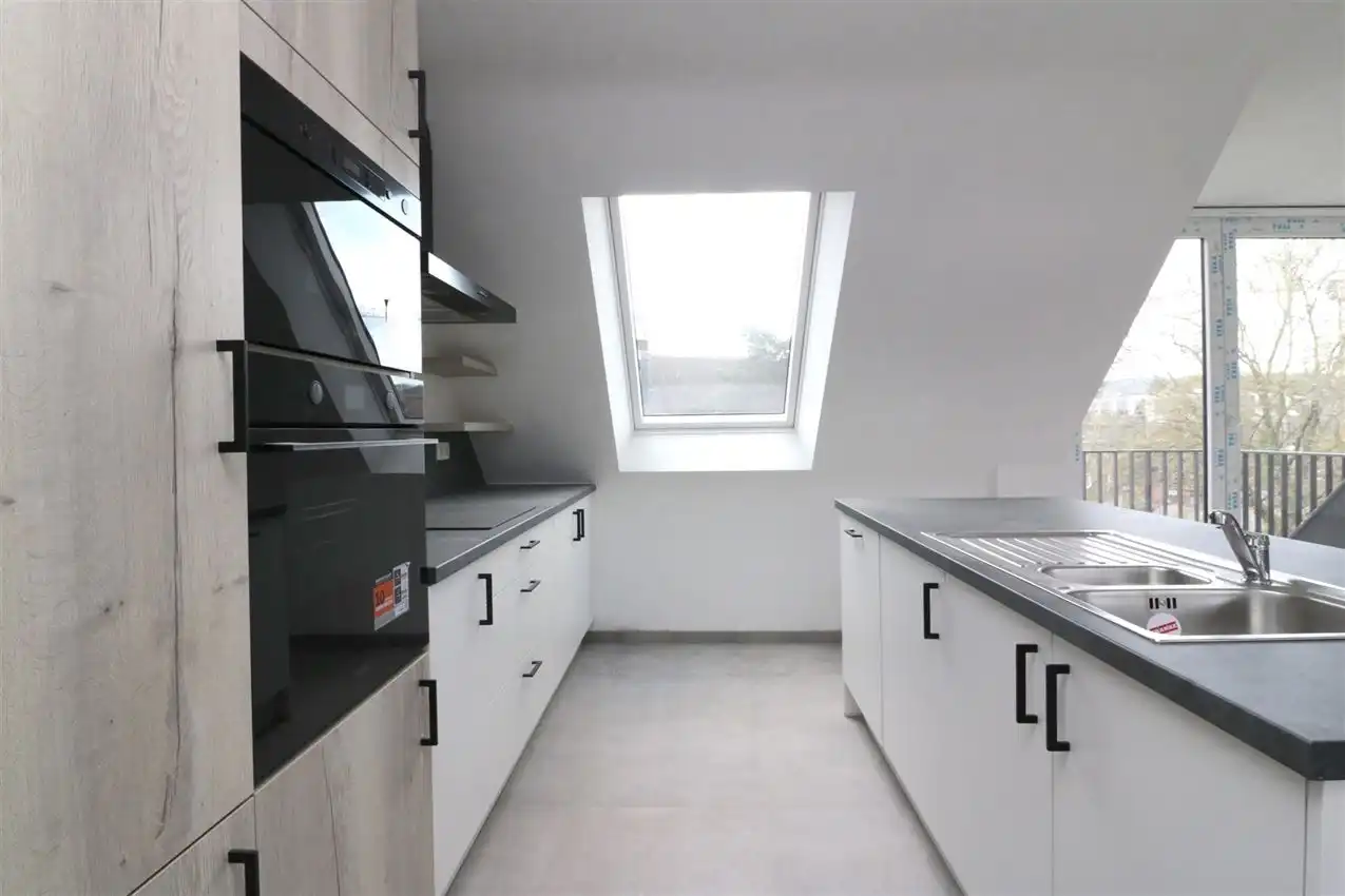 Uniek penthouse in centrum Aarschot met 1 slpk. parking en terras foto 16