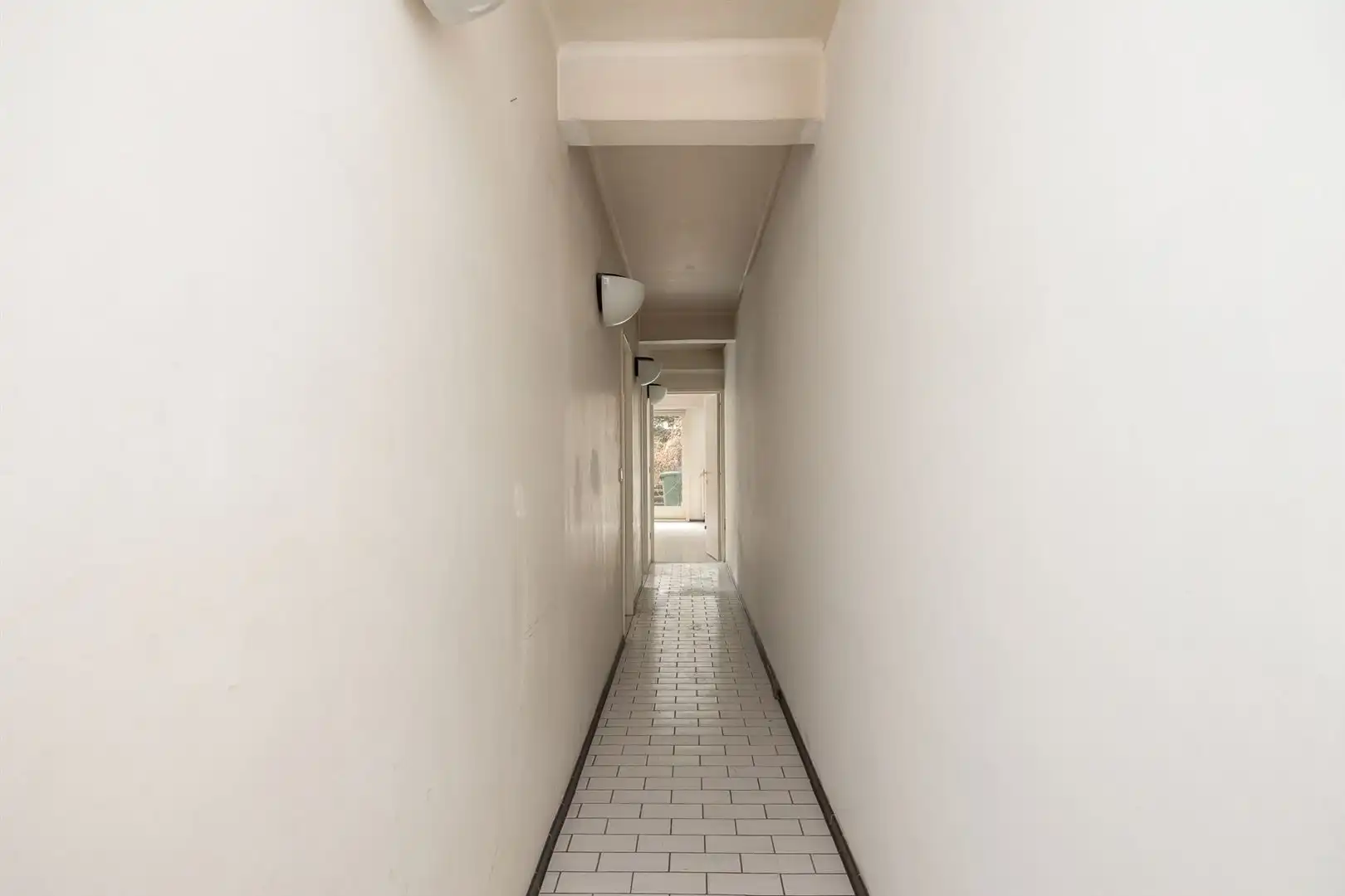 Te renoveren gelijkvloers kantoor/praktijk met tuin op toplocatie in Antwerpen

 foto 10